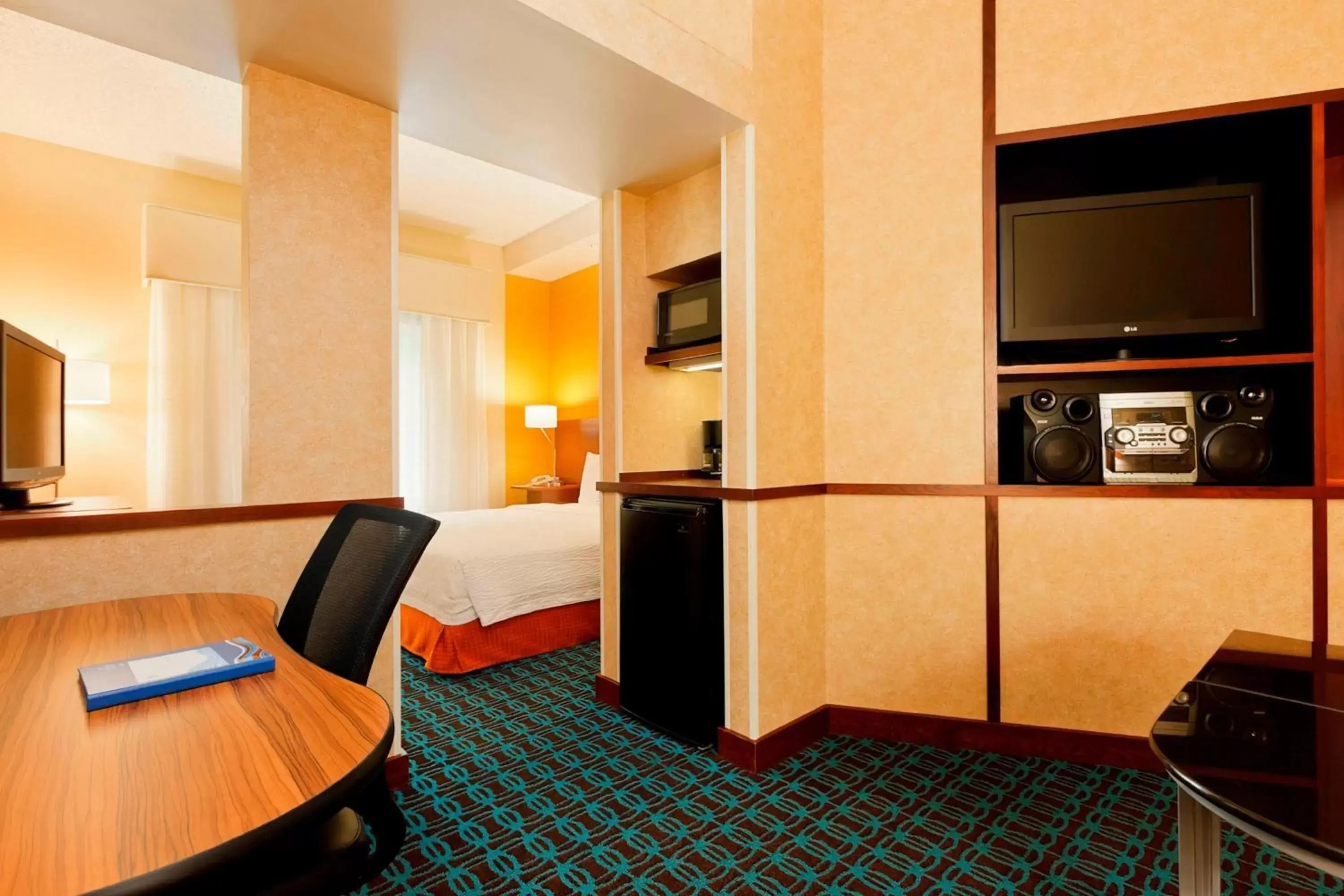 Photo of the whole room, TV/Entertainment Center in Fairfield Inn & Suites Portland South/Lake Oswego
