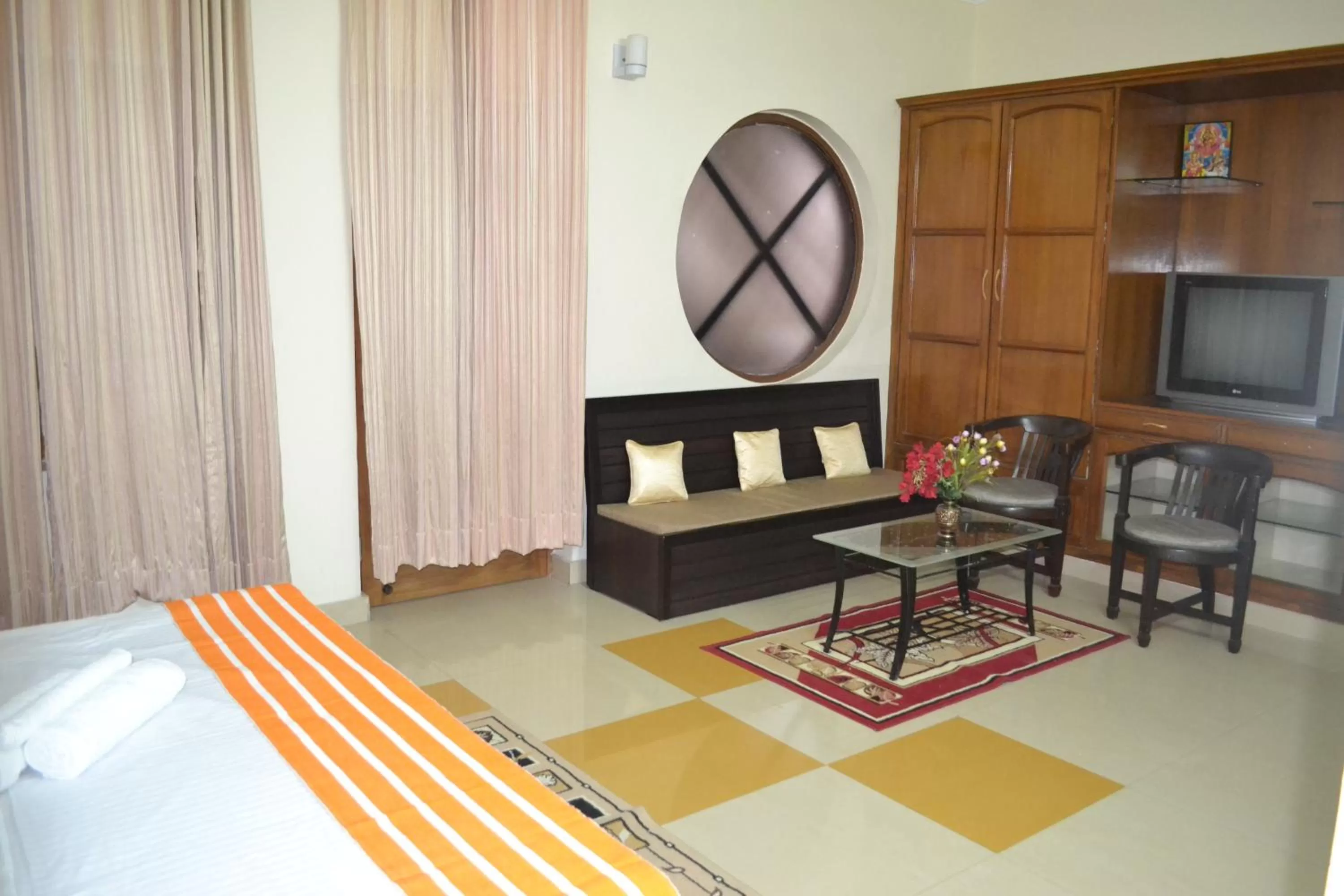 Bedroom, Seating Area in Raj Cottage Ganga Vatika