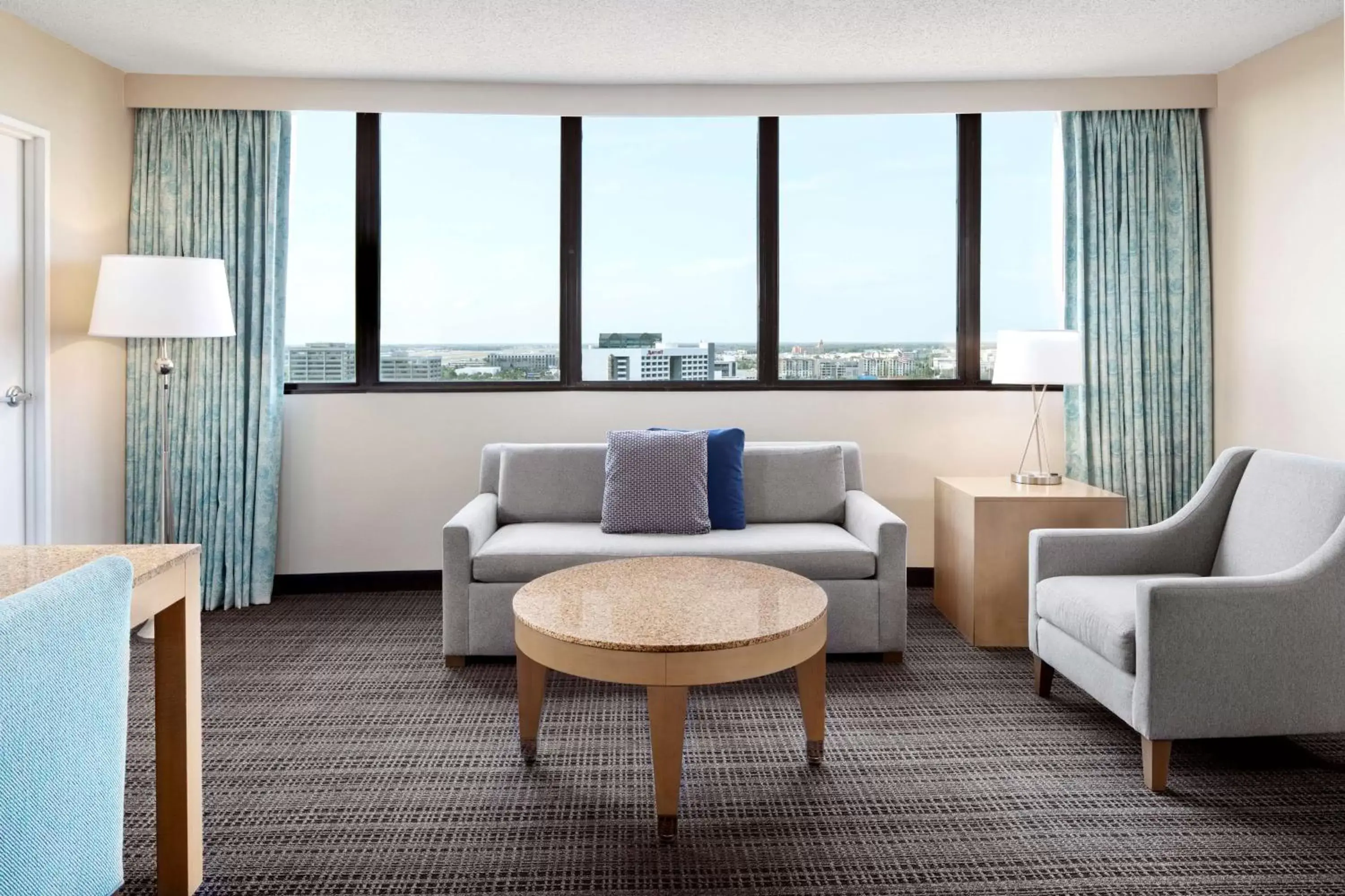 Living room, Seating Area in Embassy Suites by Hilton Tampa Airport Westshore