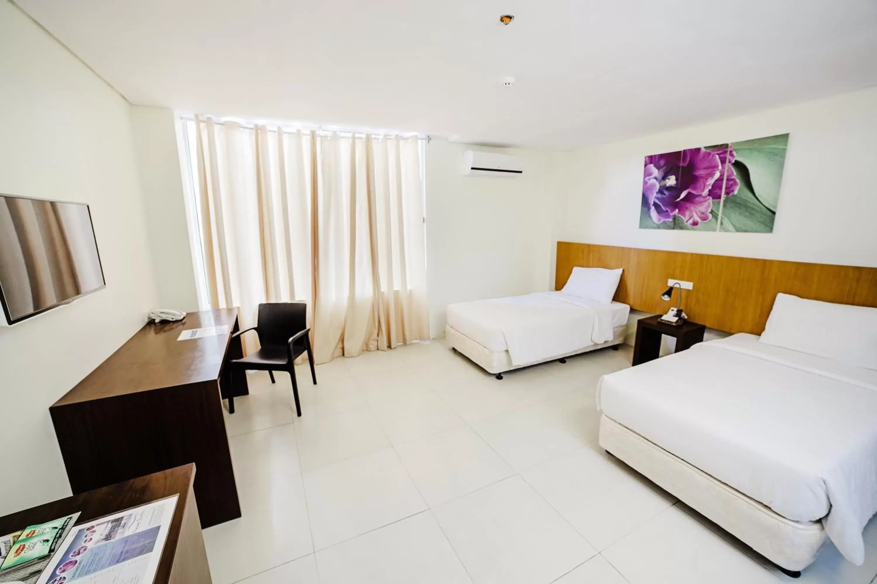 Bedroom in Ocean Suites Bohol Boutique Hotel