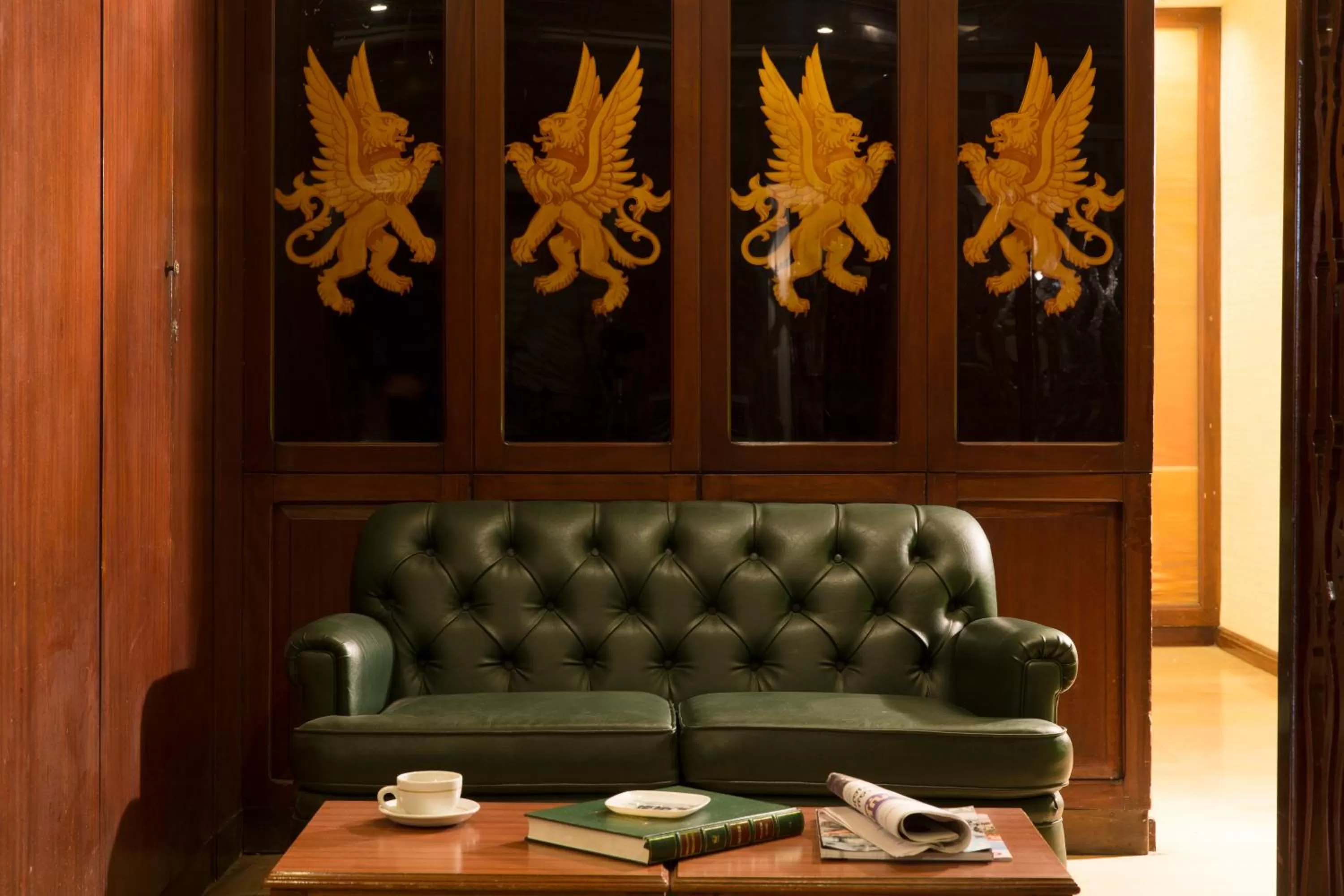 Communal lounge/ TV room in The Mayflower Hotel