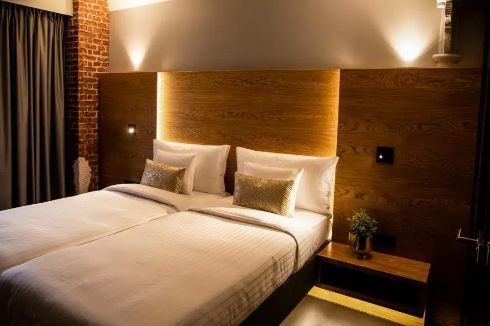 Photo of the whole room, Bed in GINN Hotel Hamburg Elbspeicher