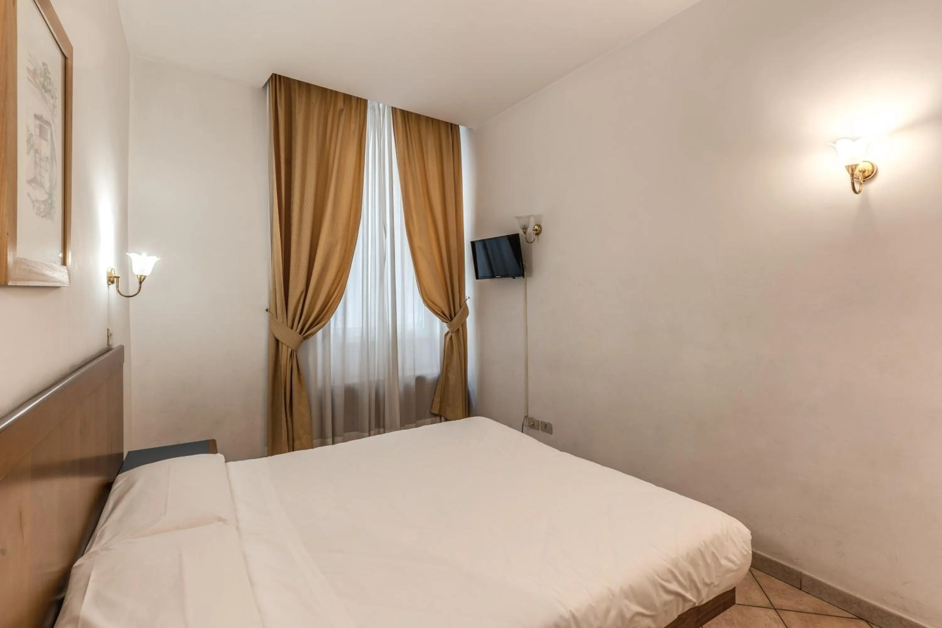 Bedroom in Hotel Pomezia