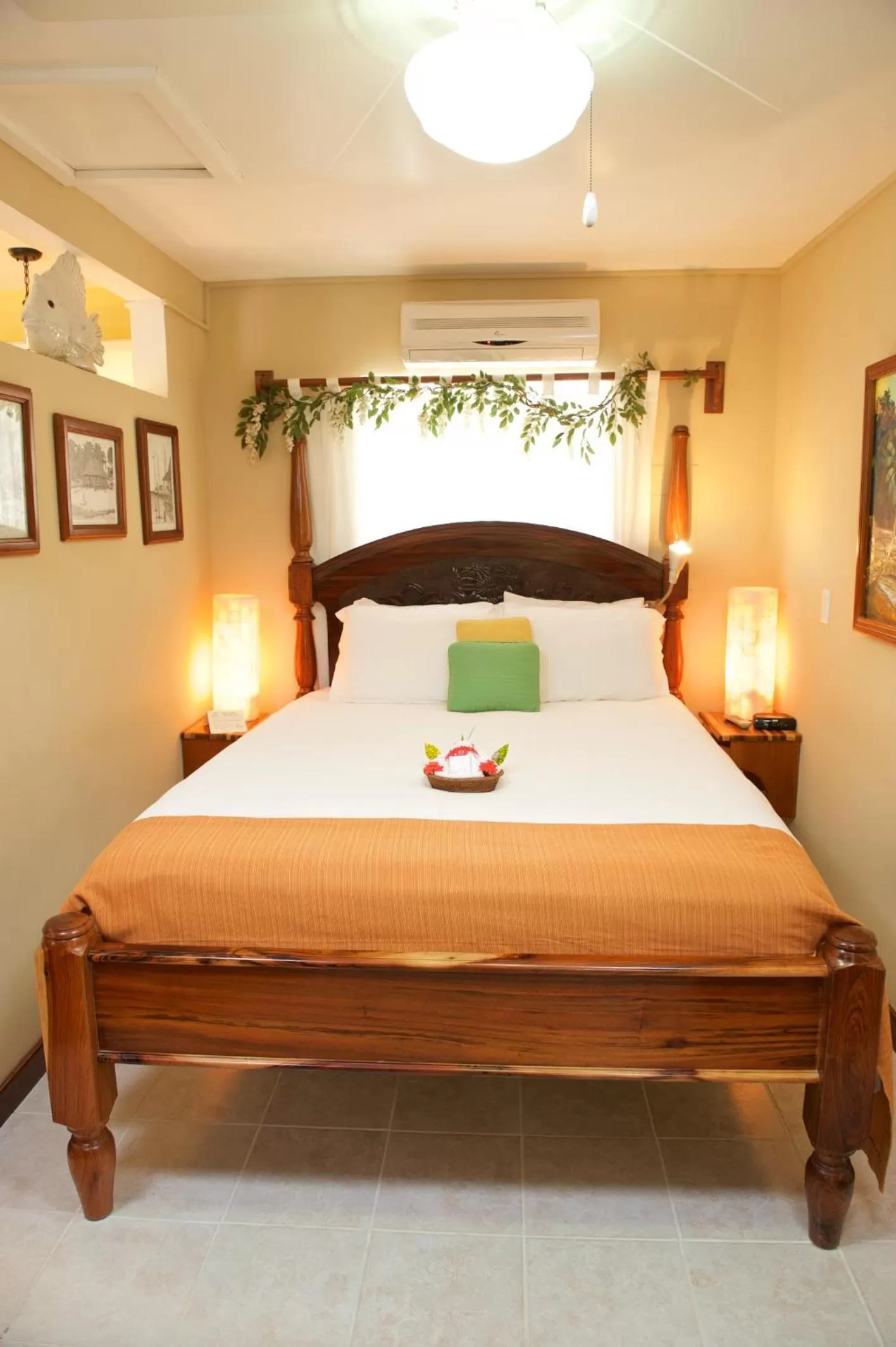 Bed in The Palms Oceanfront Suites