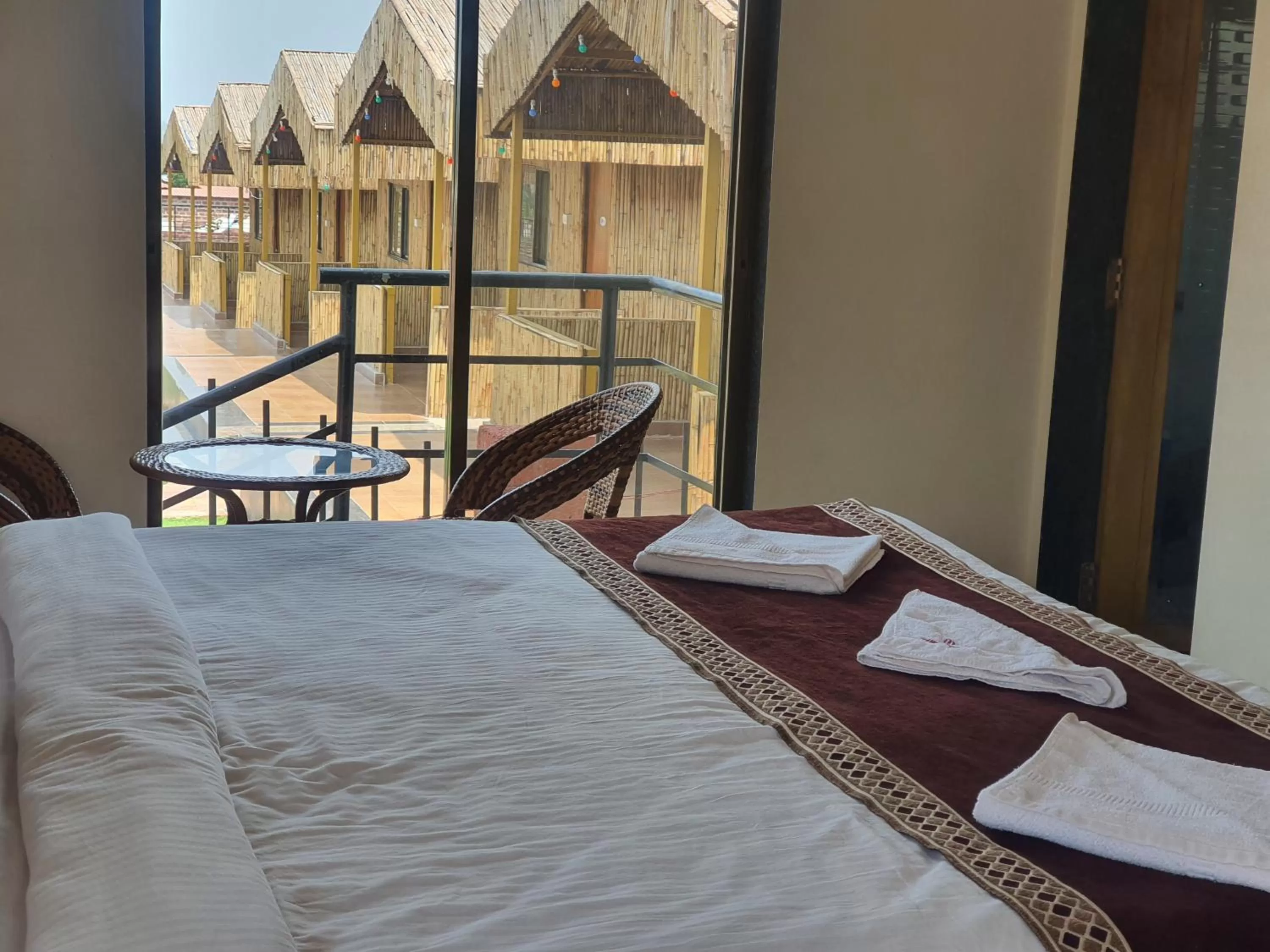 View (from property/room), Bed in Mango Valley Resort Ganpatipule