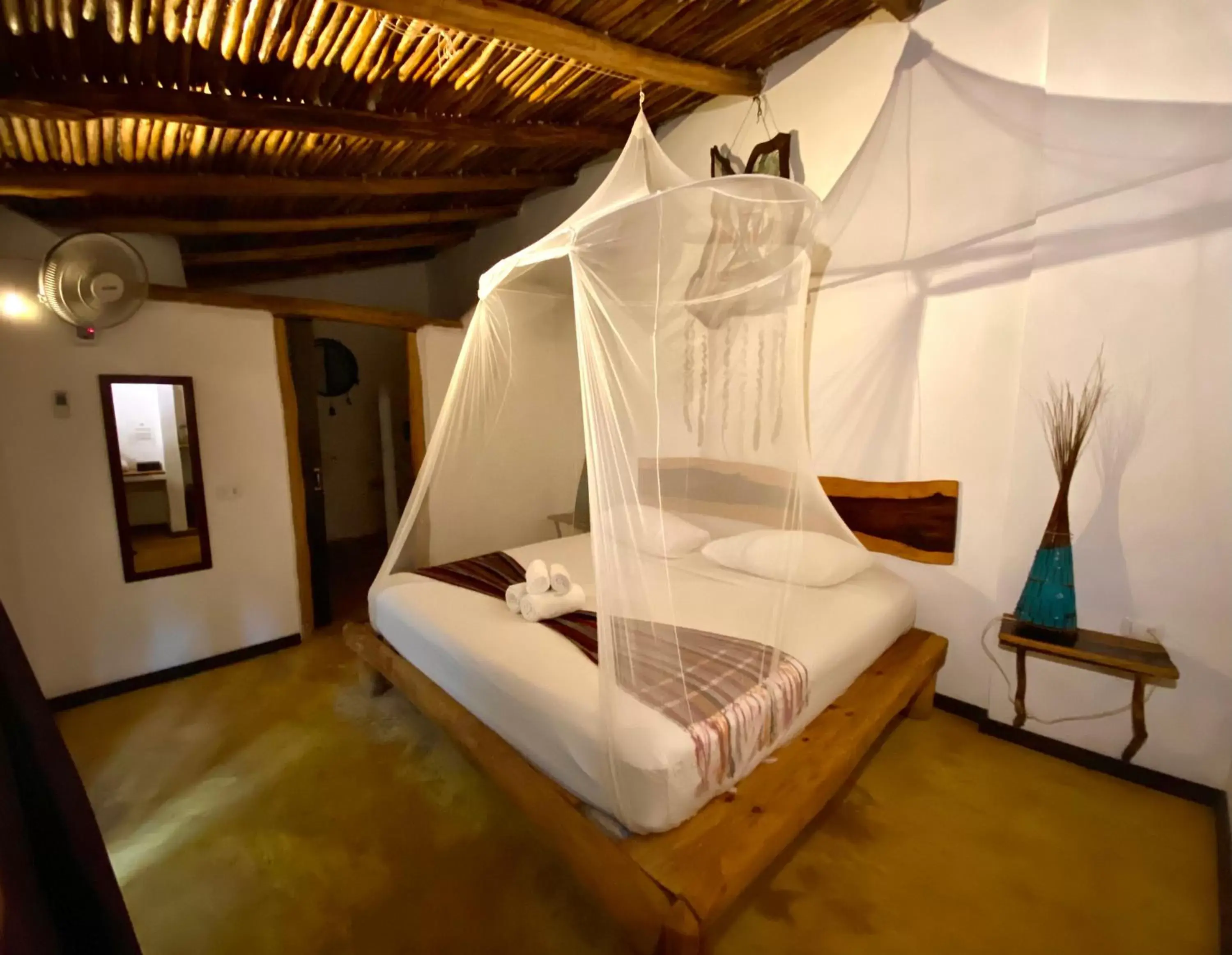 Bed in Pacha Tulum Boutique Hotel