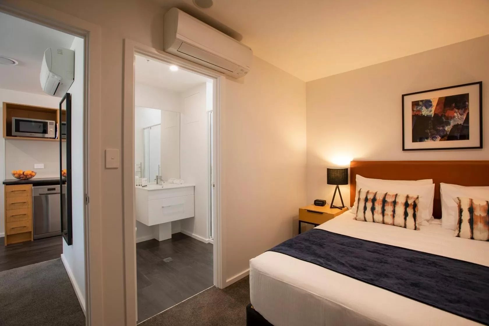 Bed in Quest Tauranga Central