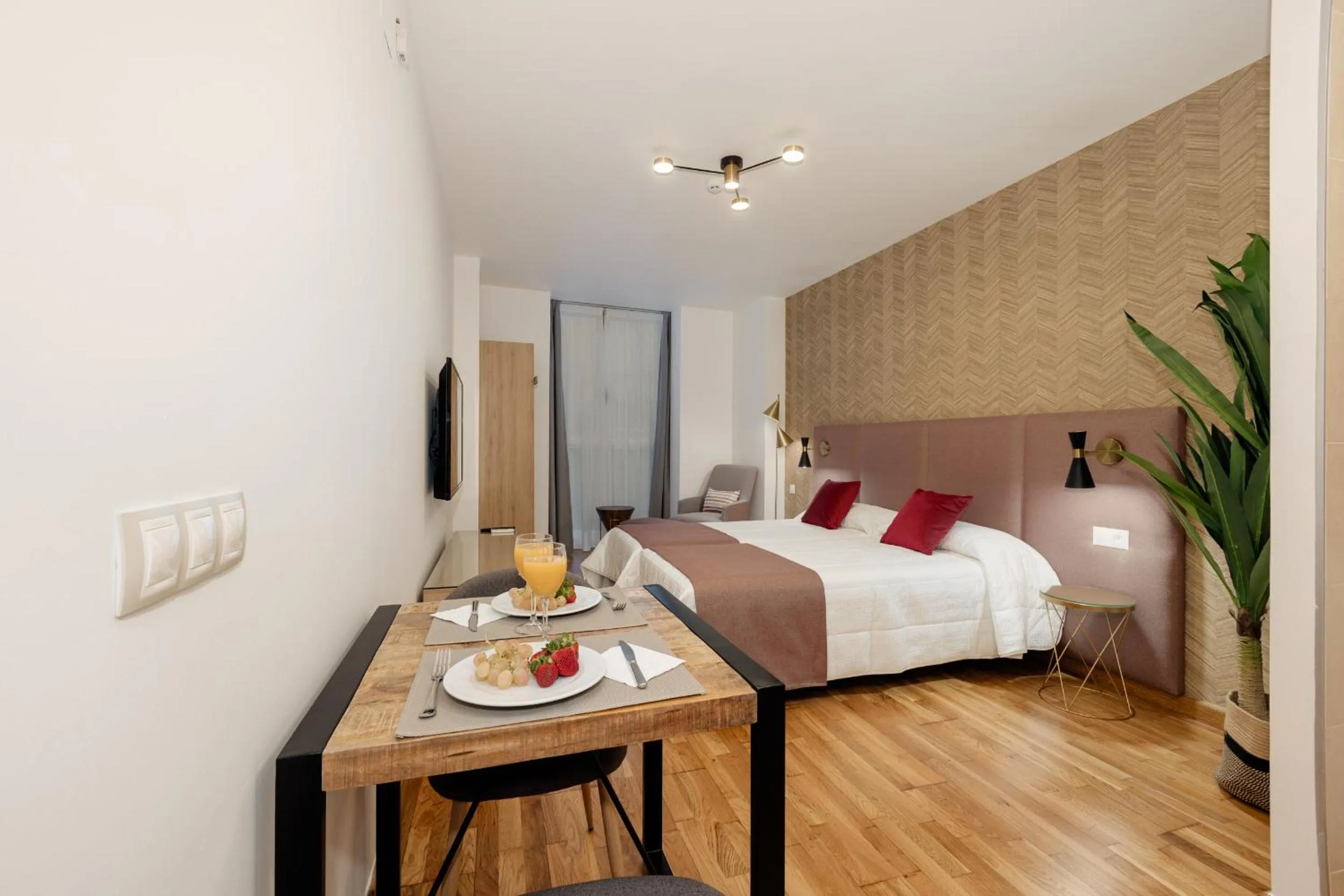 Bed in Apartamentos Debambú