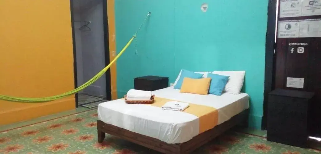 Bed in Hostal Xiinbal