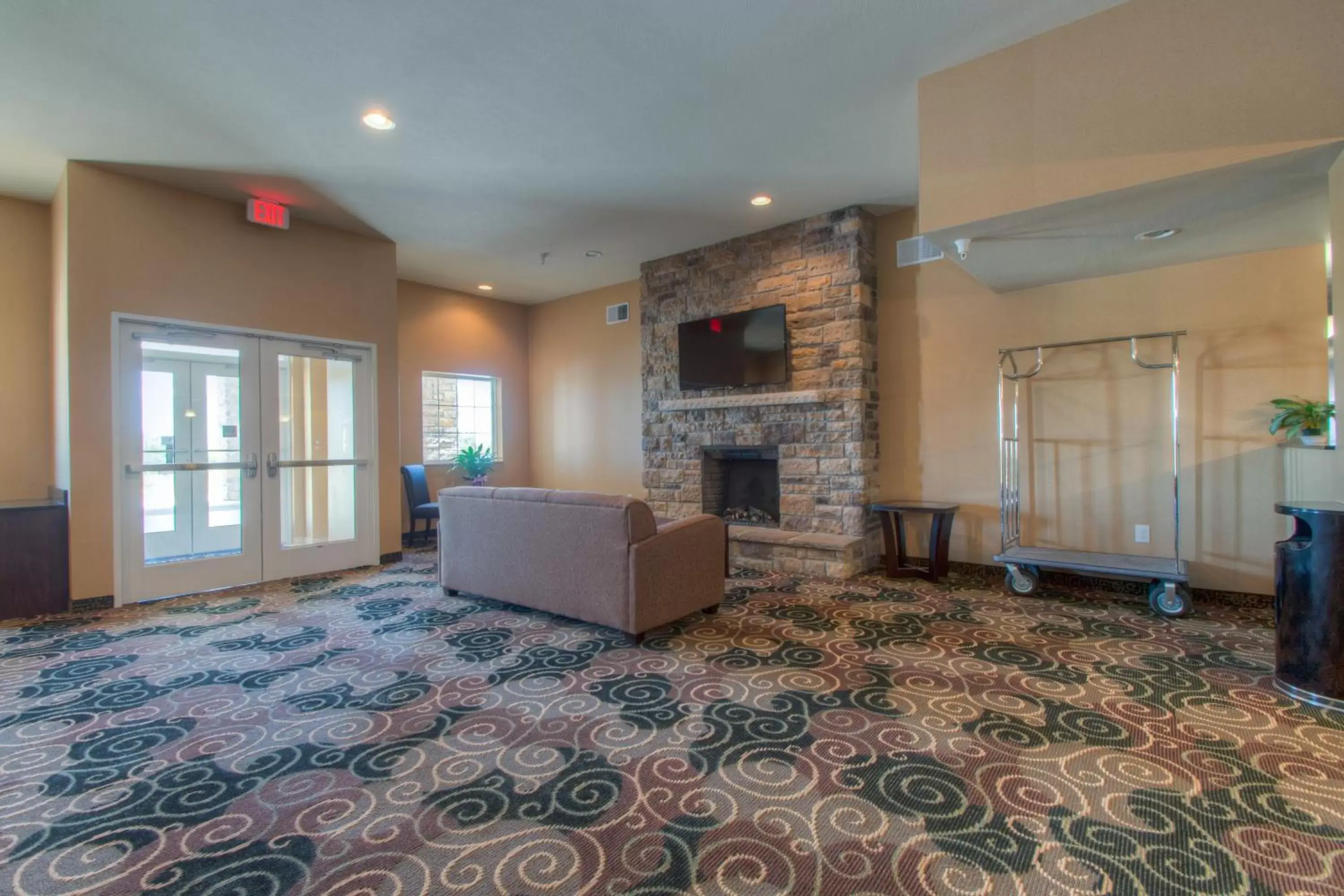 Communal lounge/ TV room in Cobblestone Inn & Suites - Wray