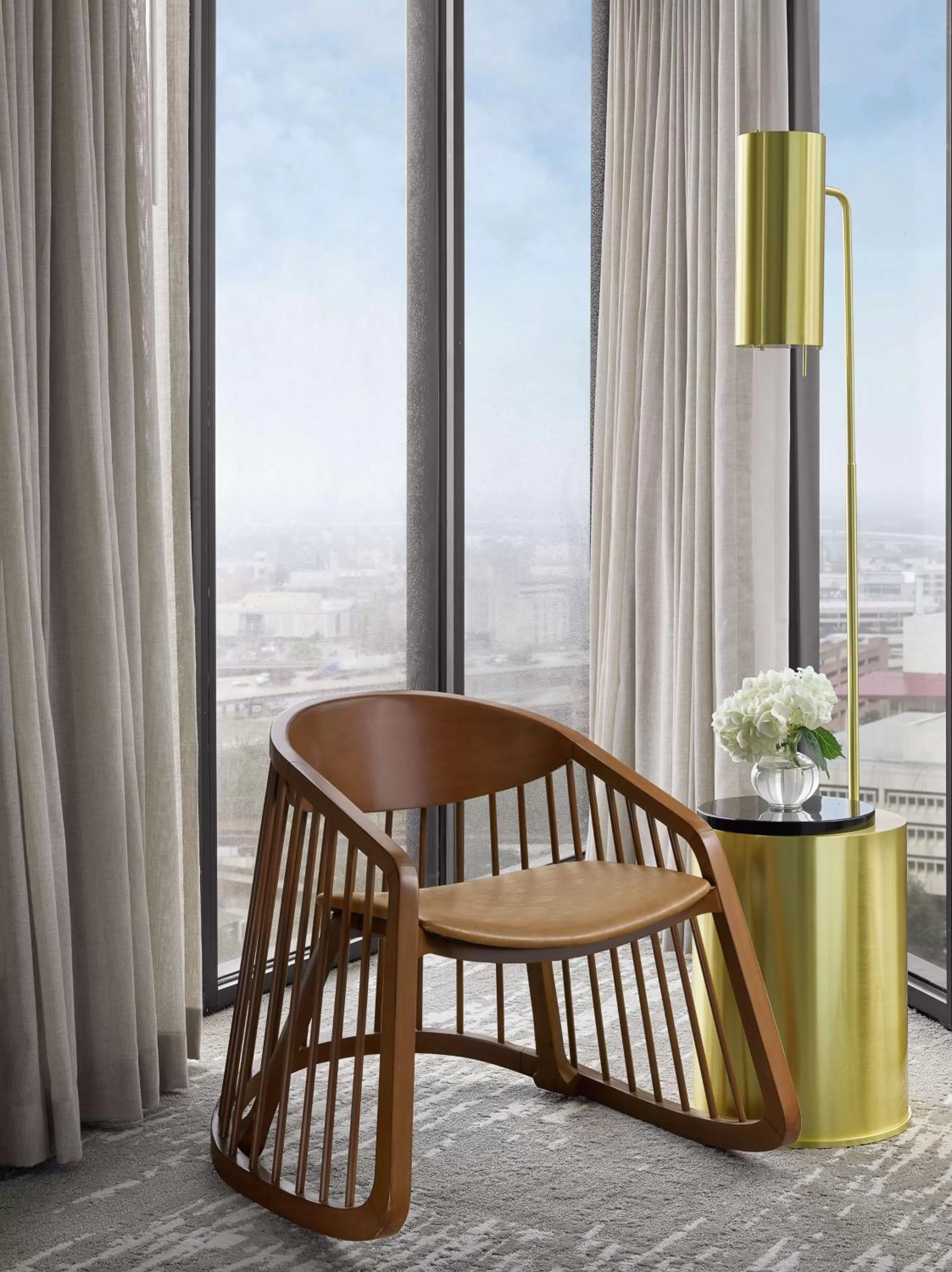 Living room in C. Baldwin, Curio Collection by Hilton