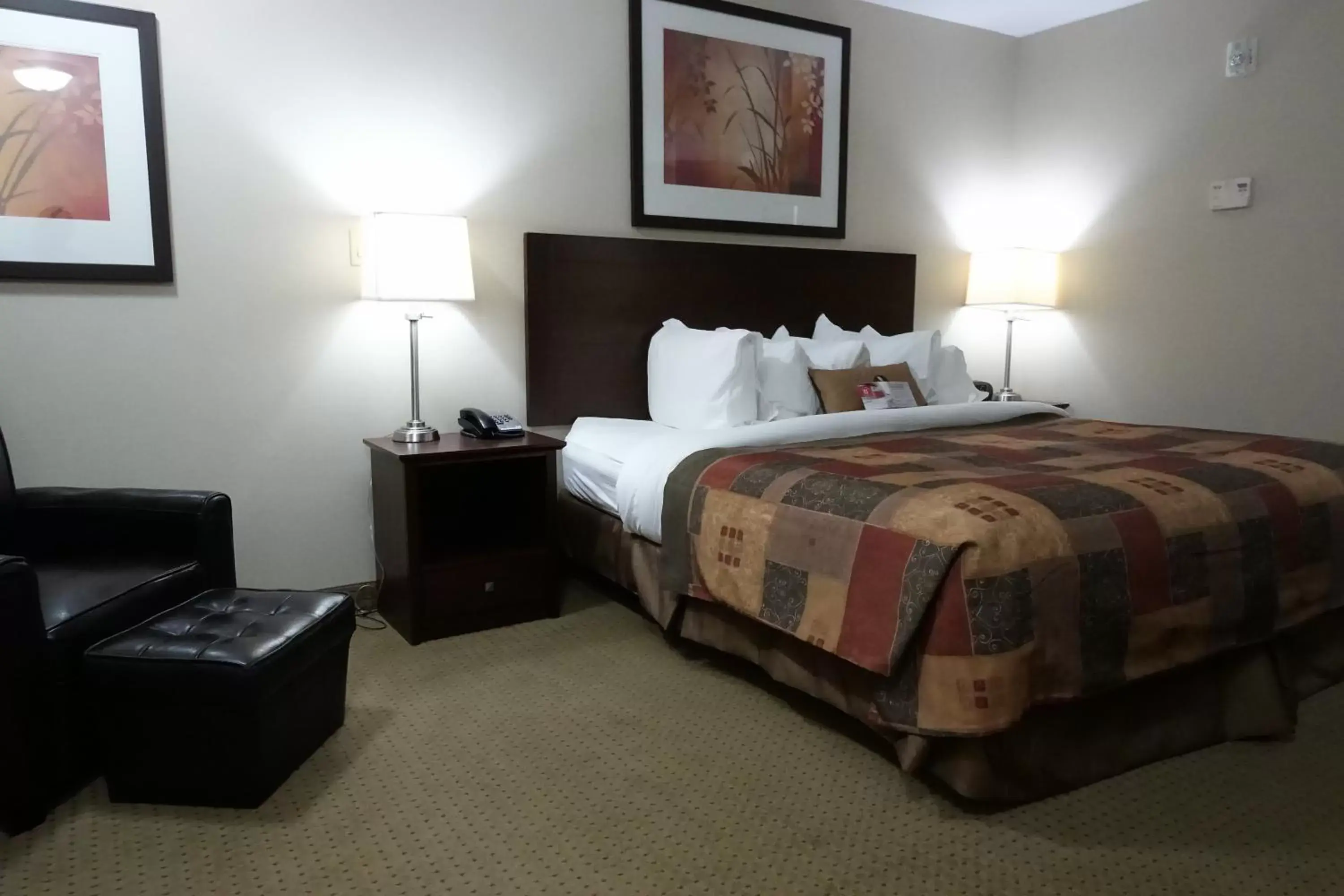 Bedroom, Bed in Ramada by Wyndham Weyburn