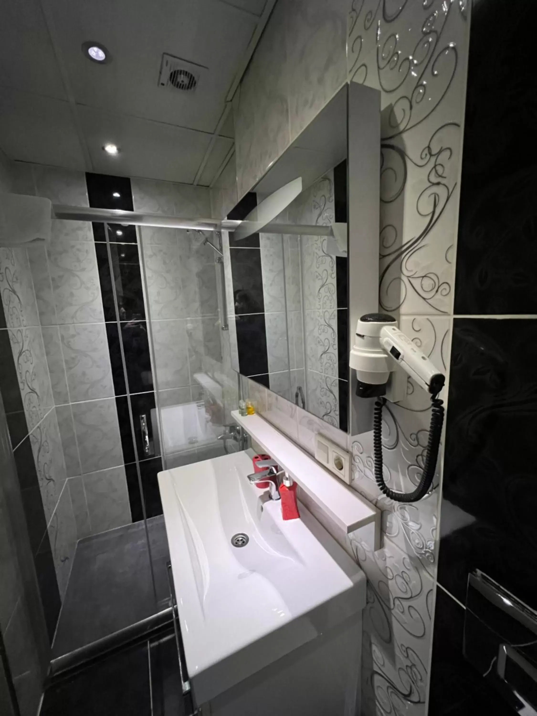 Bathroom in Zendy Suite Hotel