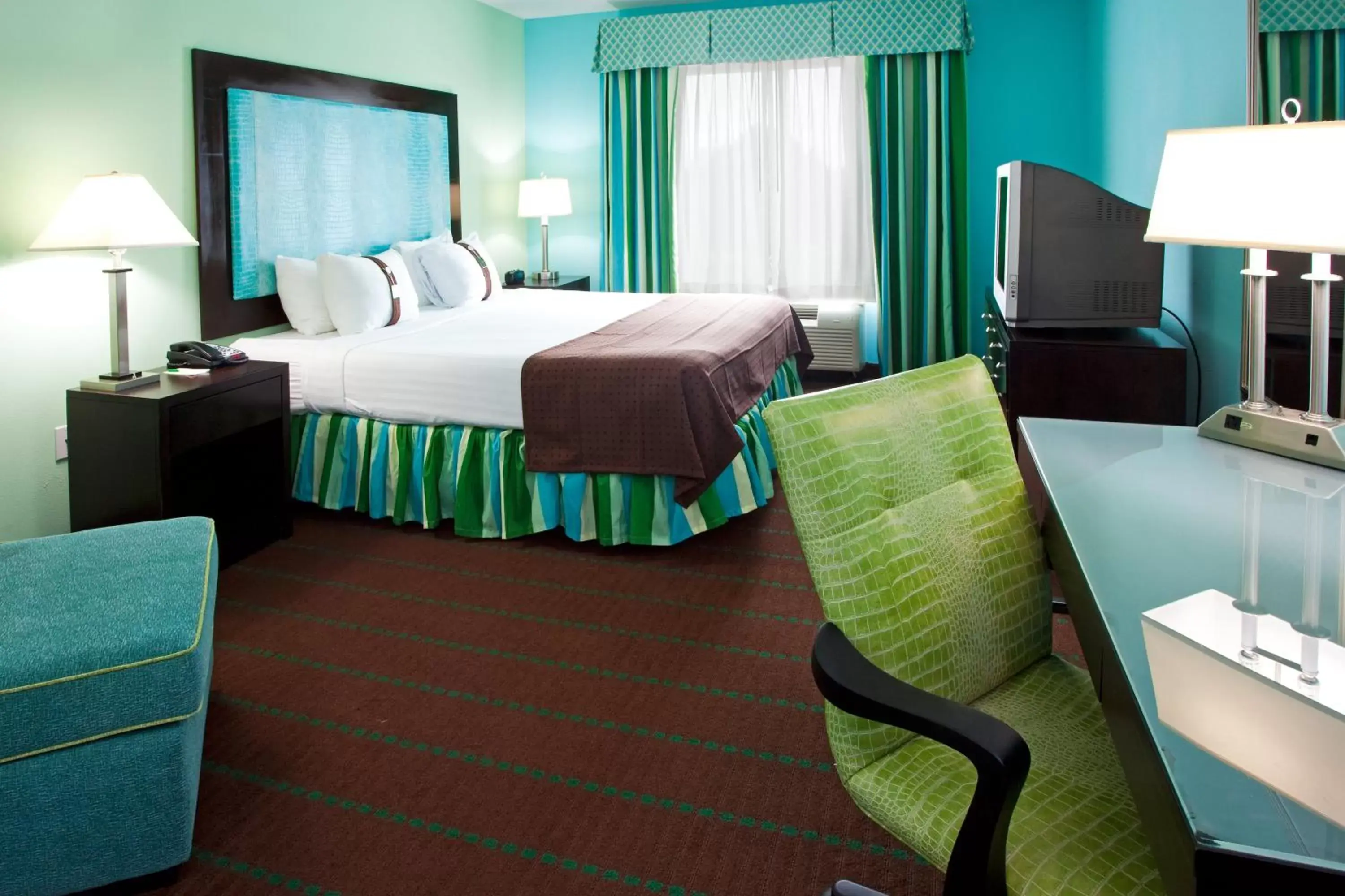 Photo of the whole room, Bed in Holiday Inn Hotel & Suites Ocala Conference Center, an IHG Hotel