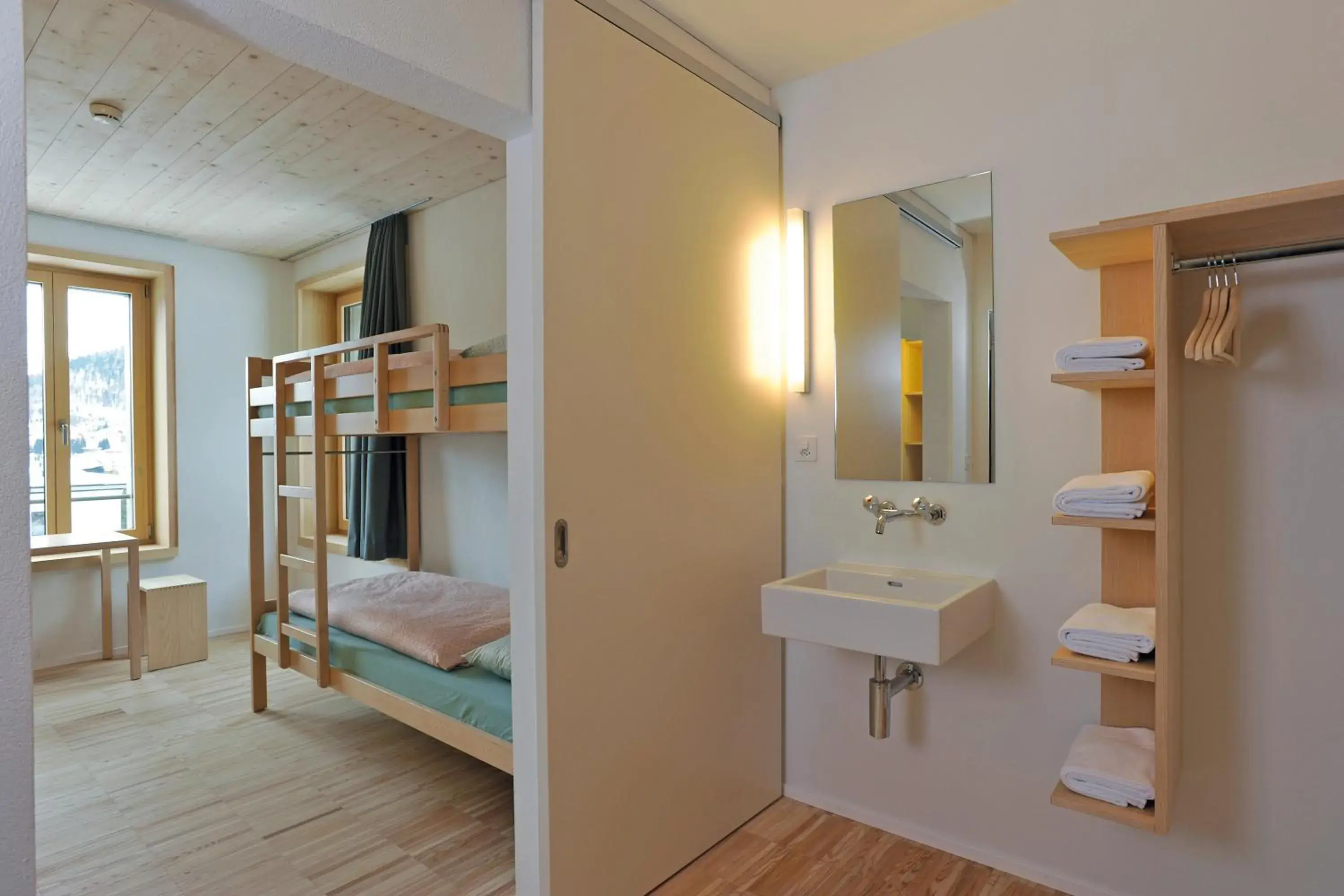 Photo of the whole room, Bathroom in St. Moritz Youth Hostel