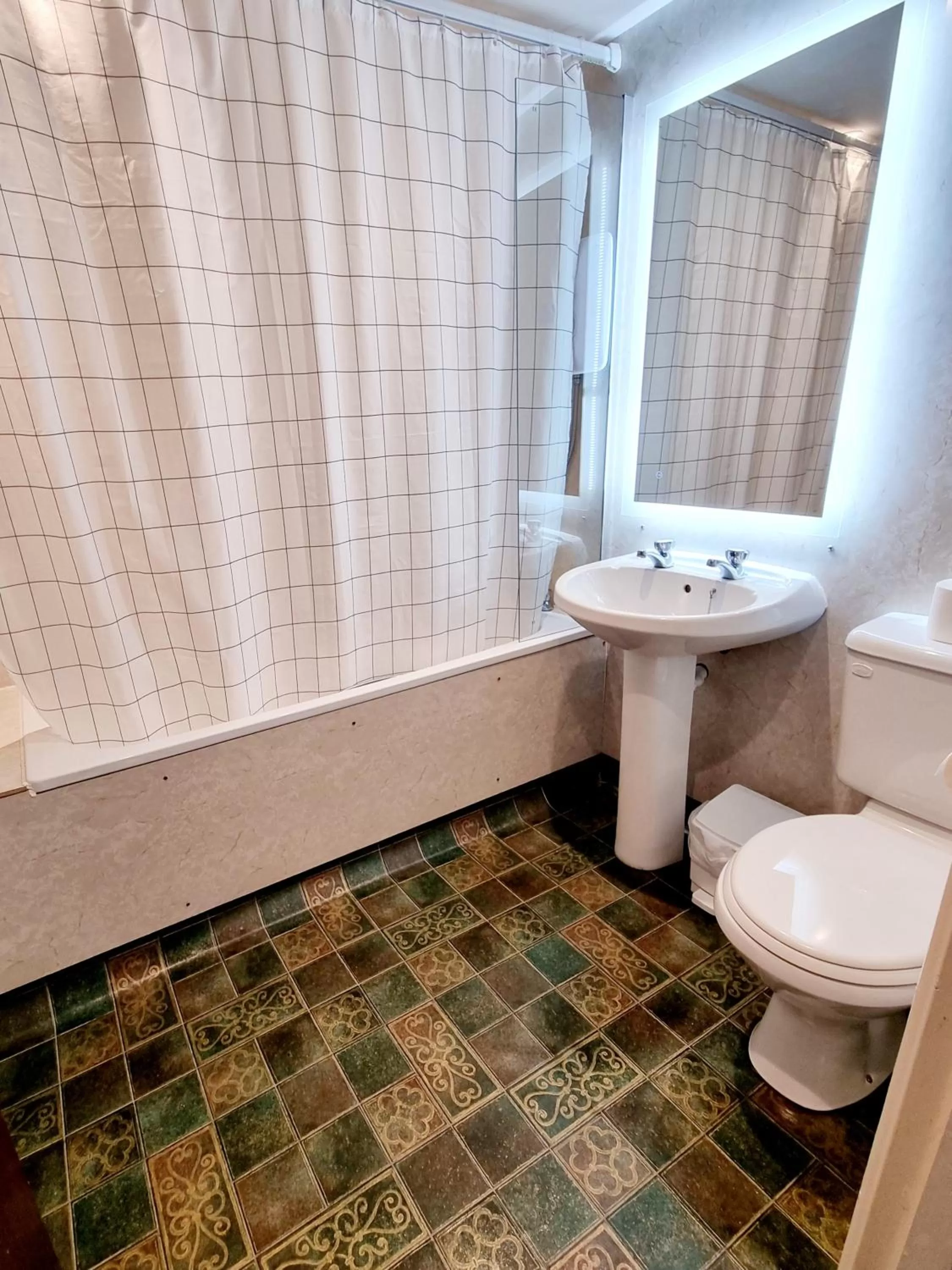 Bathroom in The Sportsmans Inn Limited