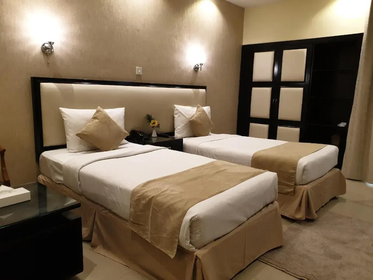 Bed in Palm Beach Hotel