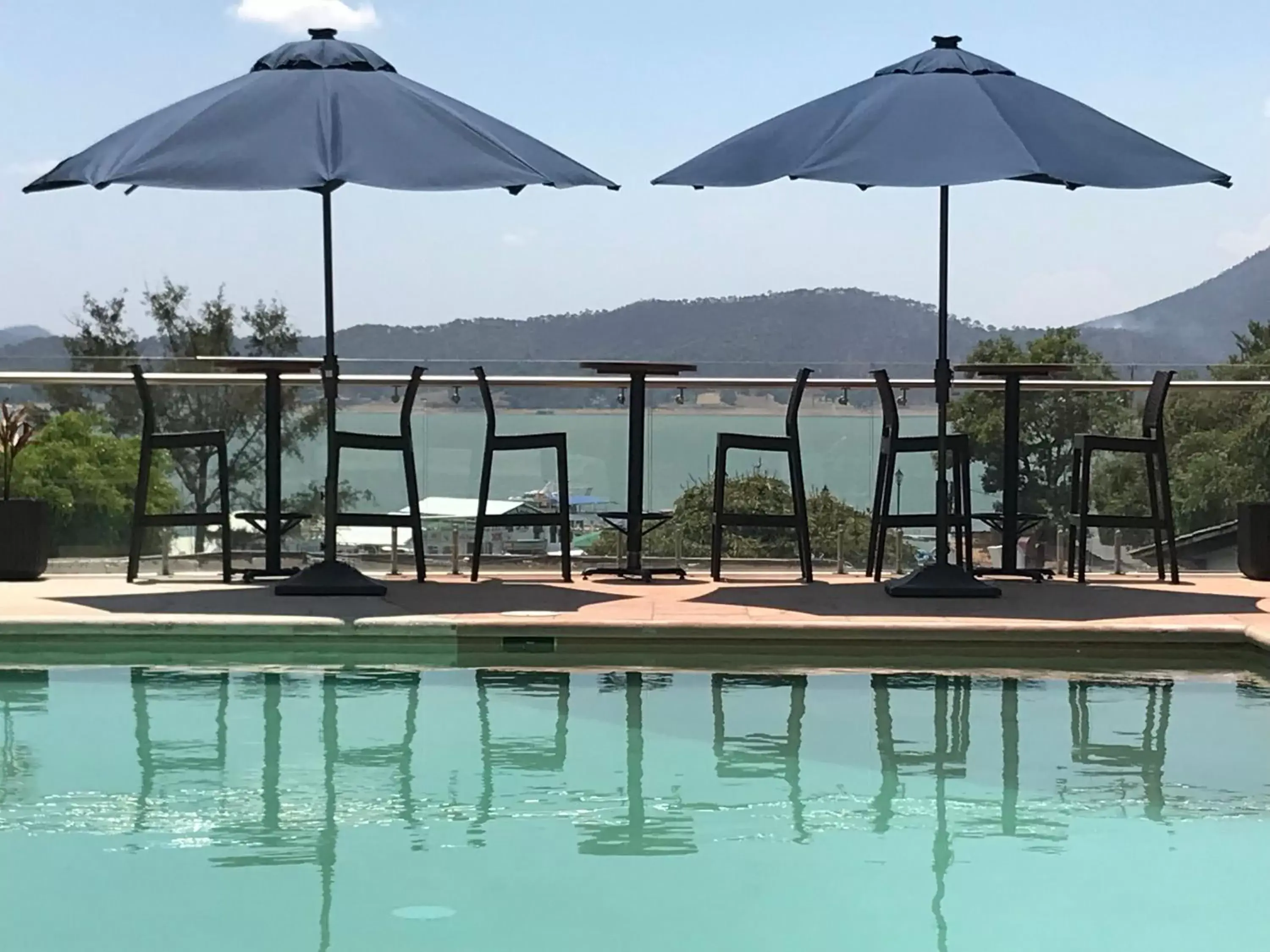 Lounge or bar, Swimming Pool in Hotel puesta del sol