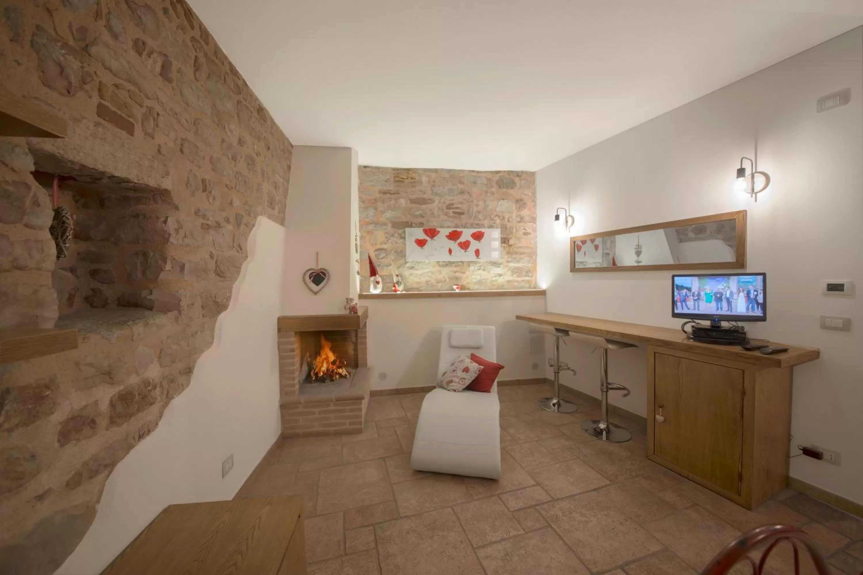 Photo of the whole room, TV/Entertainment Center in La Residenza Dei Cappuccini