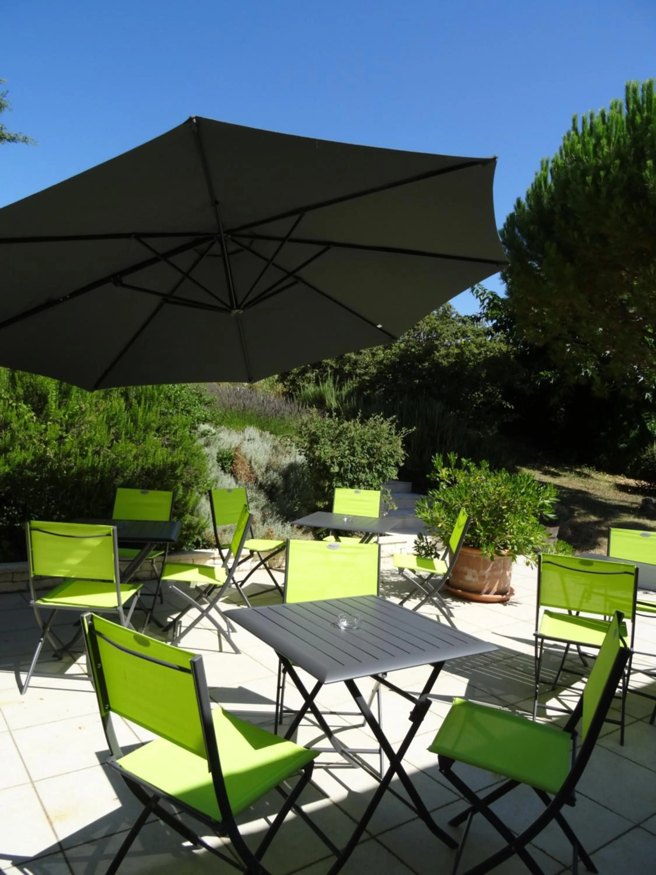 Patio in Domaine de l'Echassier, The Originals Relais