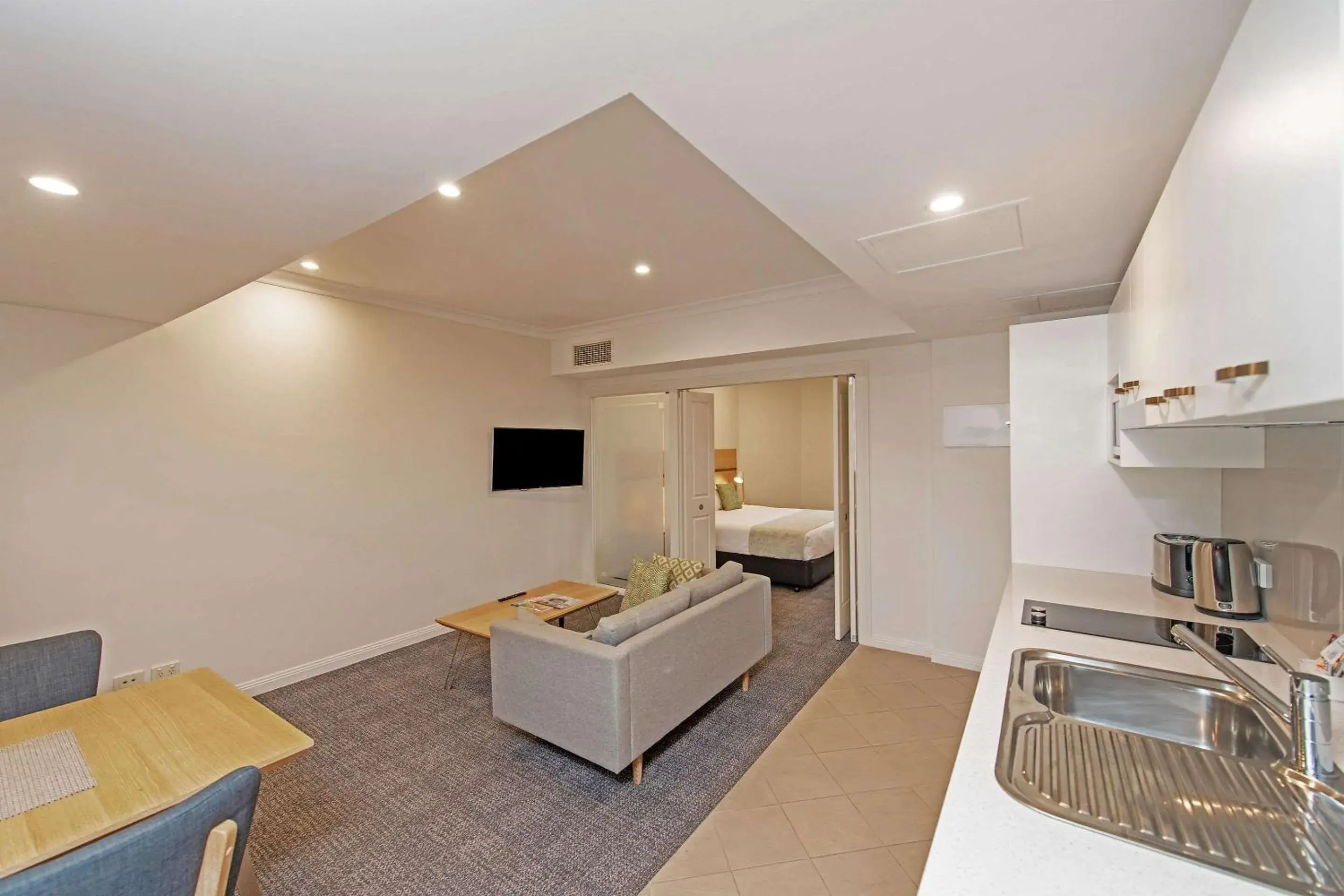 Photo of the whole room, Seating Area in Quality Apartments Adelaide Central