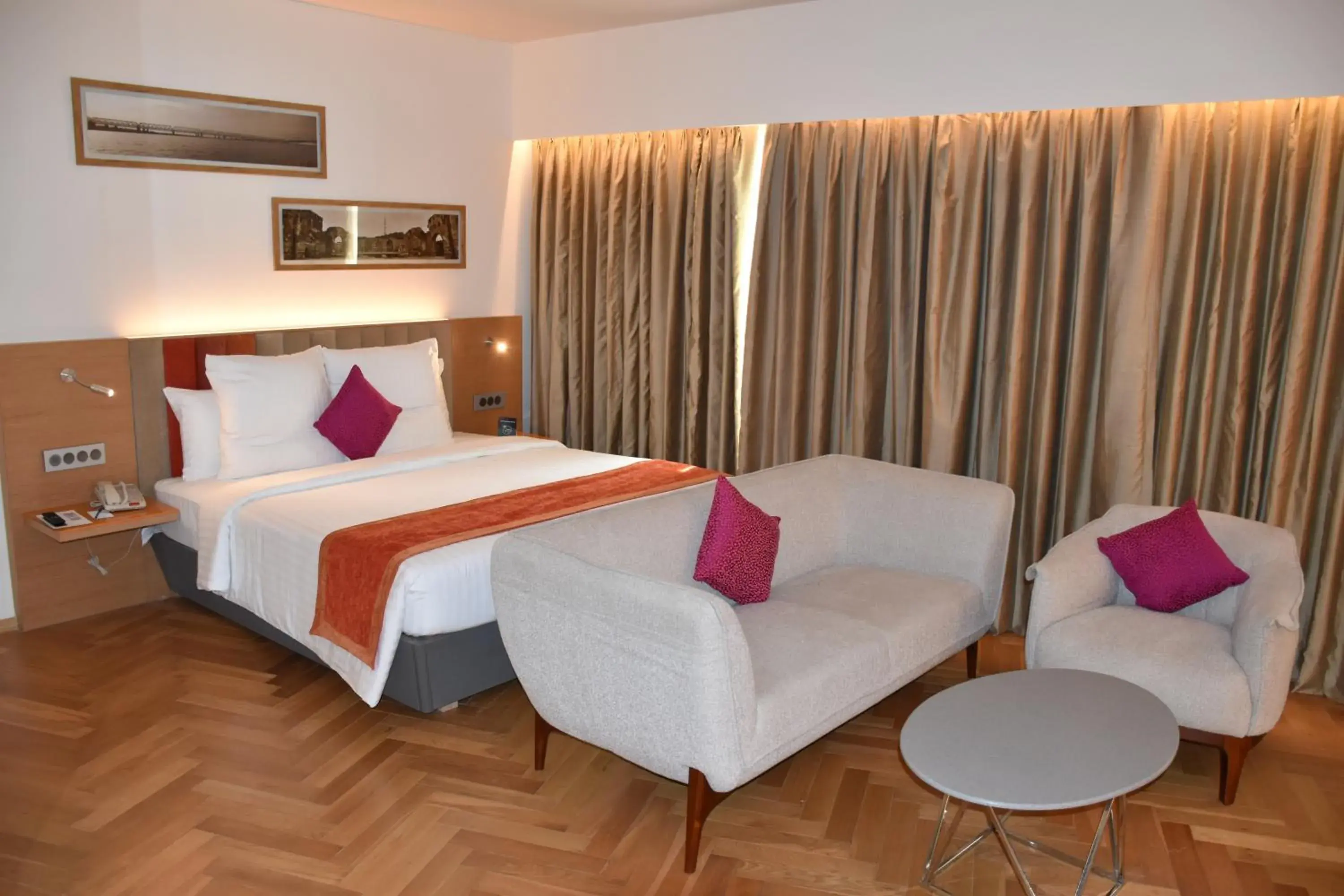 Bed in Novotel Vijayawada Varun