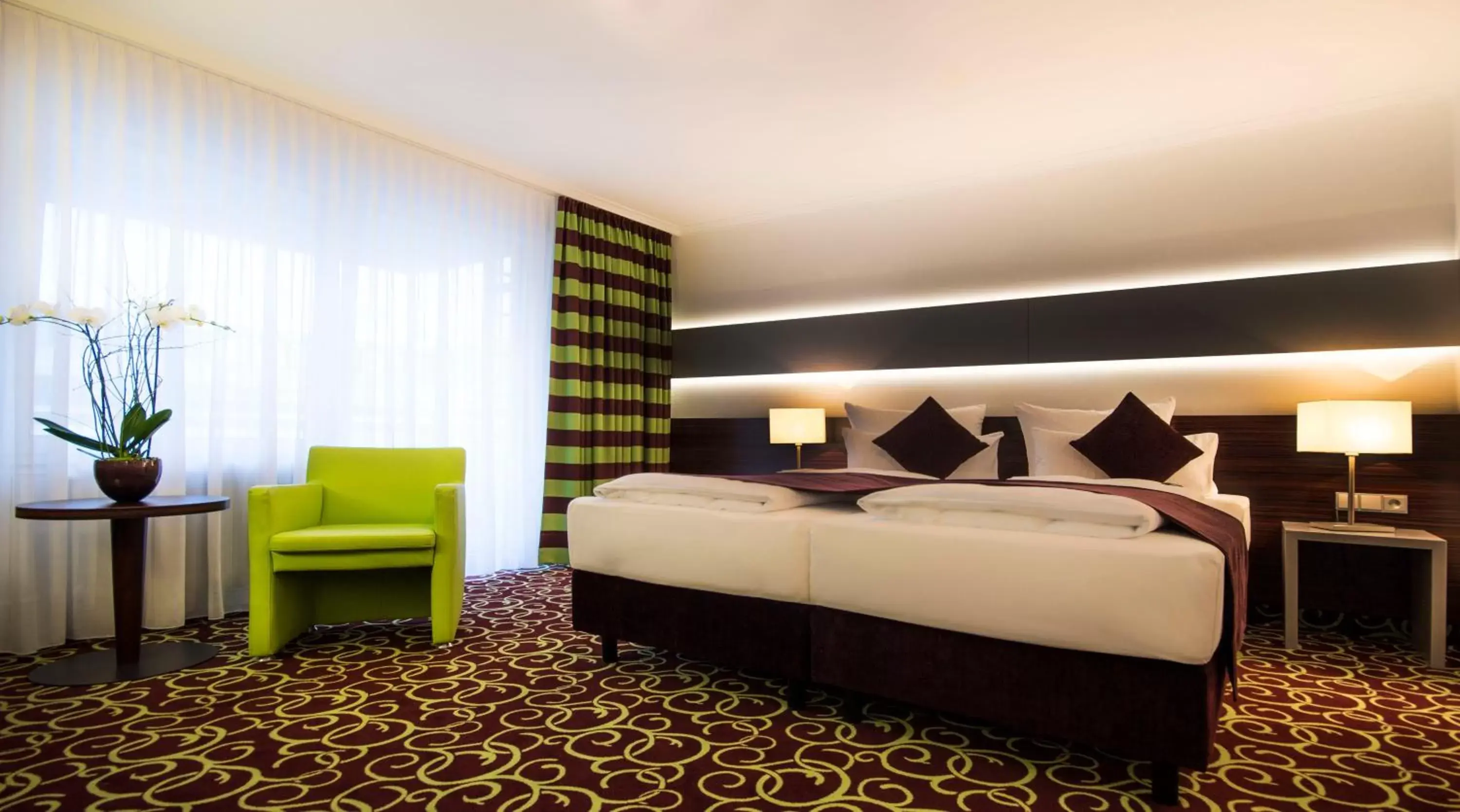 Bed in Hotel Metropol by Maier Privathotels