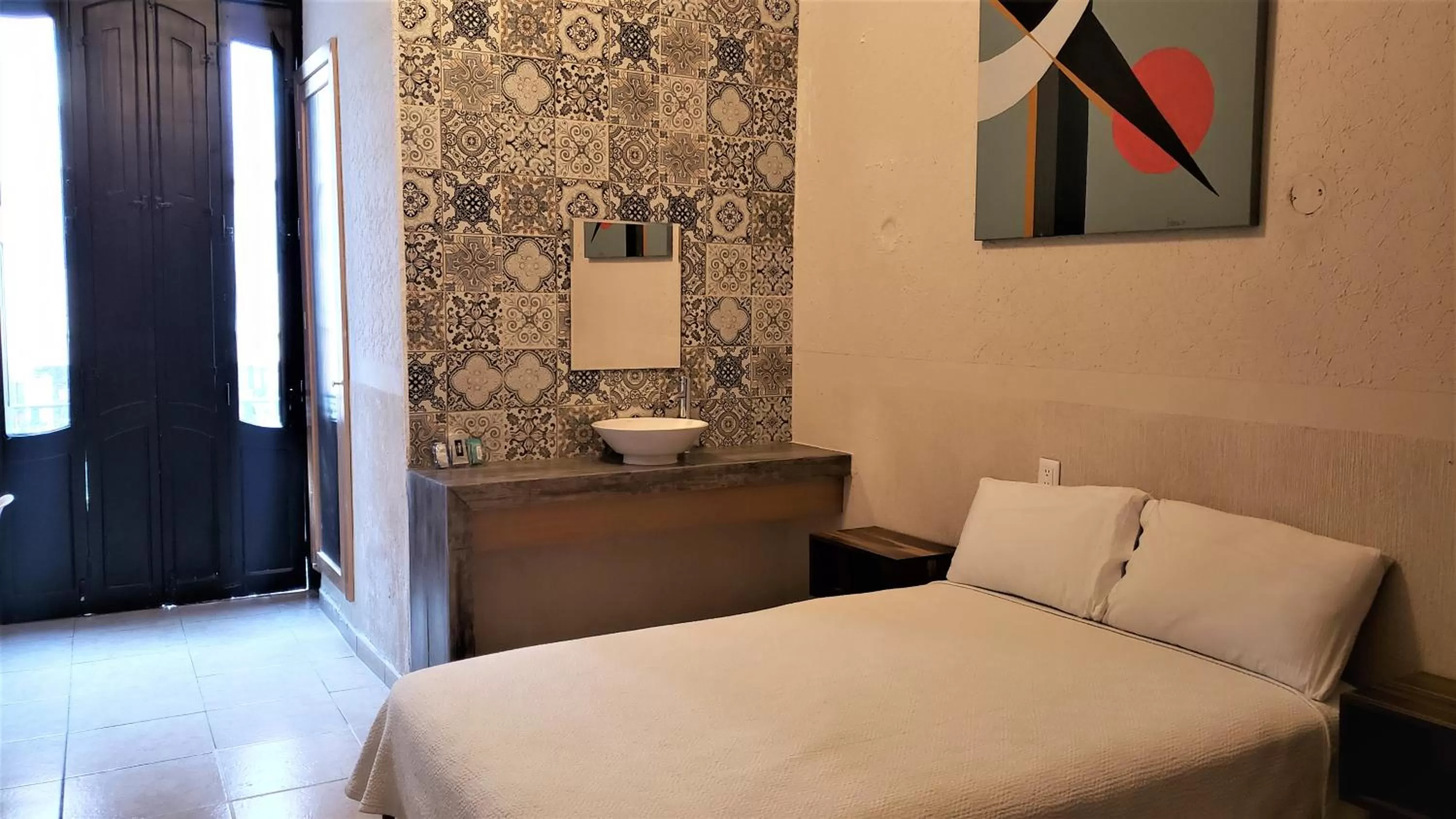 Bed in Hotel Grand Isitia