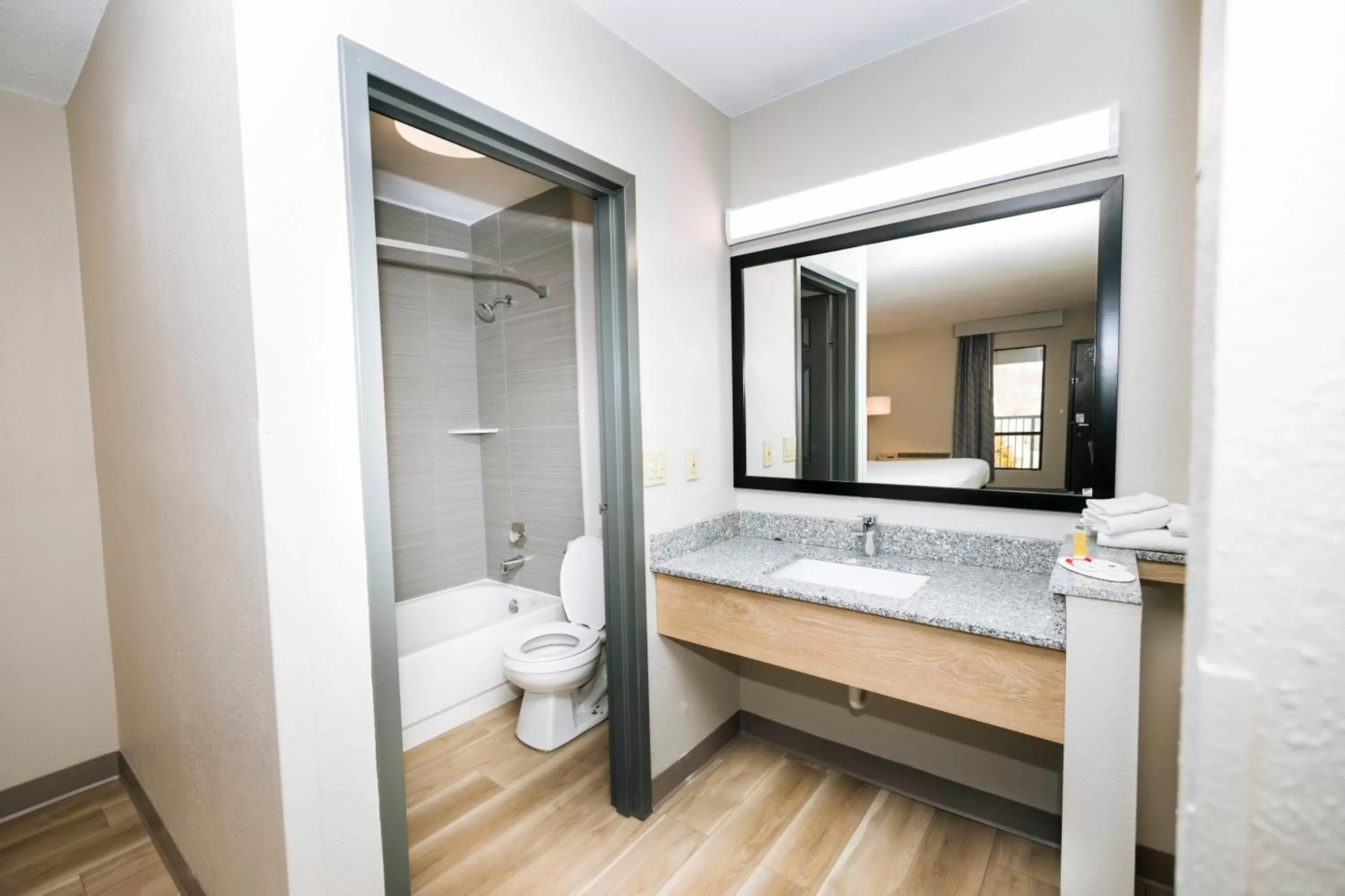 Bathroom in Days Inn by Wyndham Cincinnati East