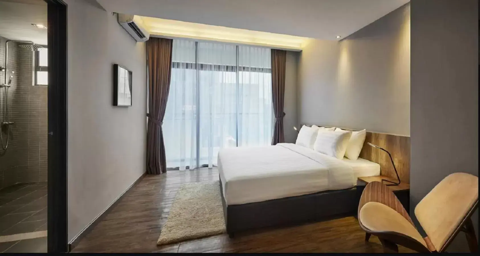 Bed in Tropics Eight Suites Bed in Tropics Eight Suites