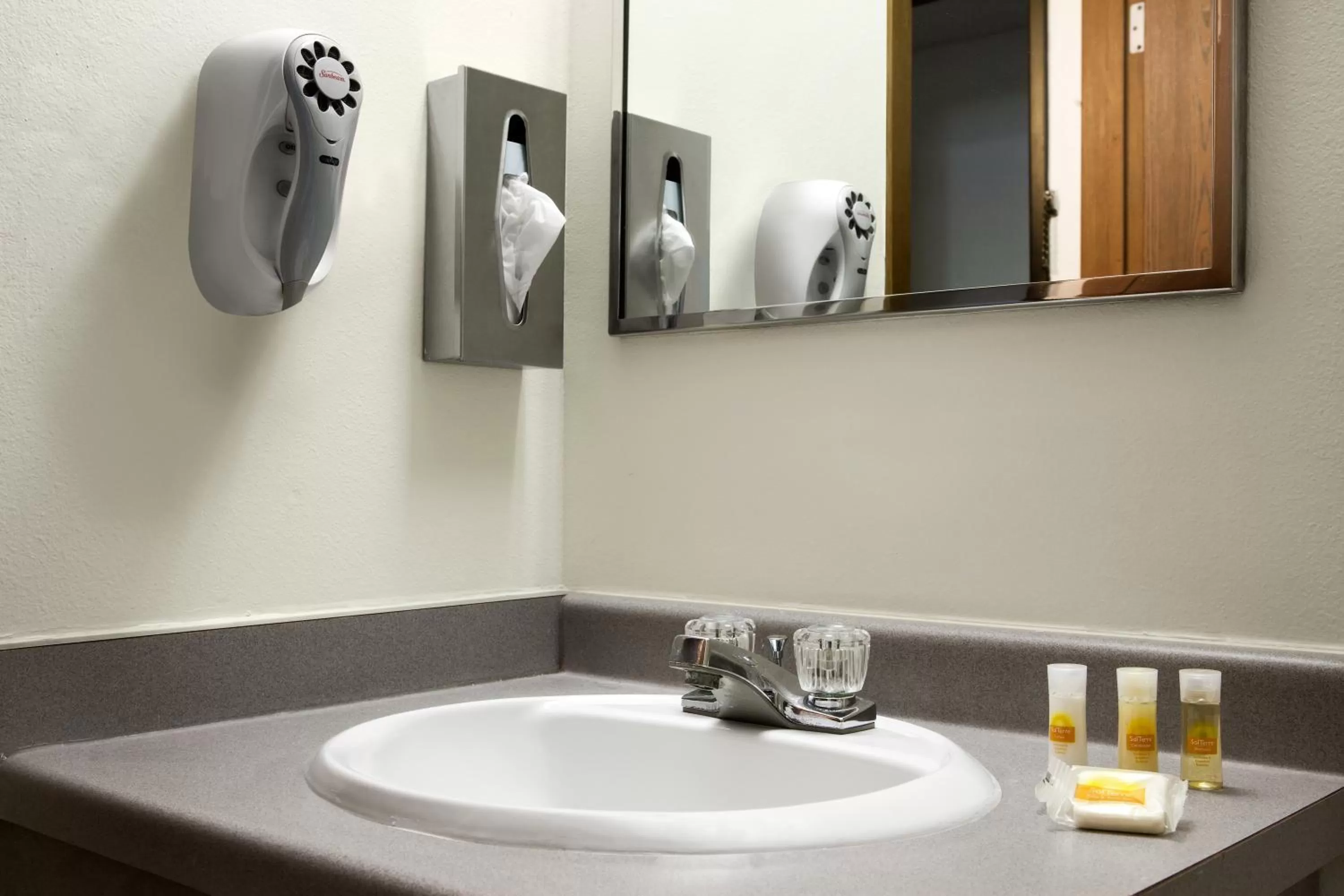 Bathroom in Days Inn by Wyndham Austin