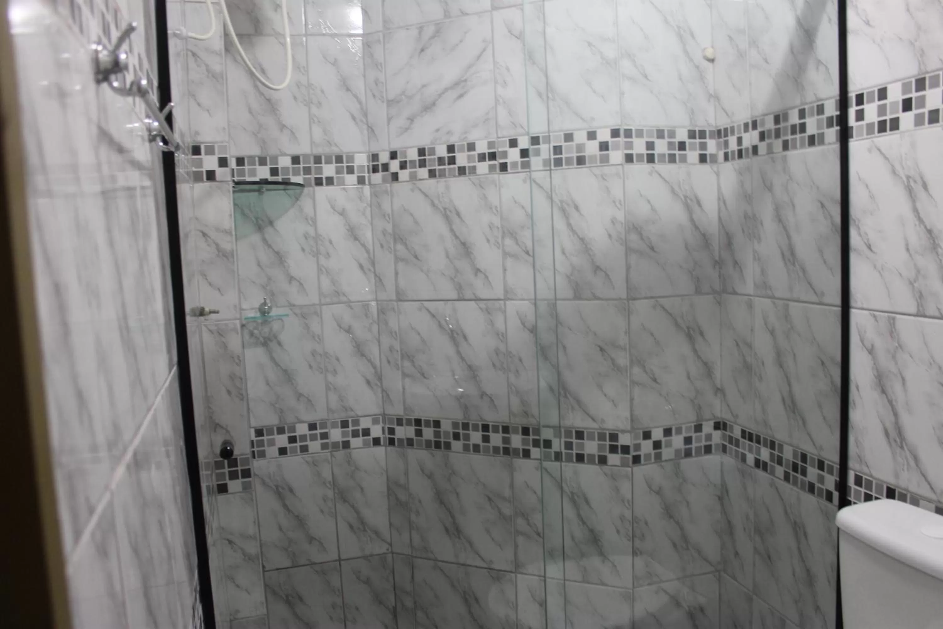 Bathroom in Pousada Das Palmeiras