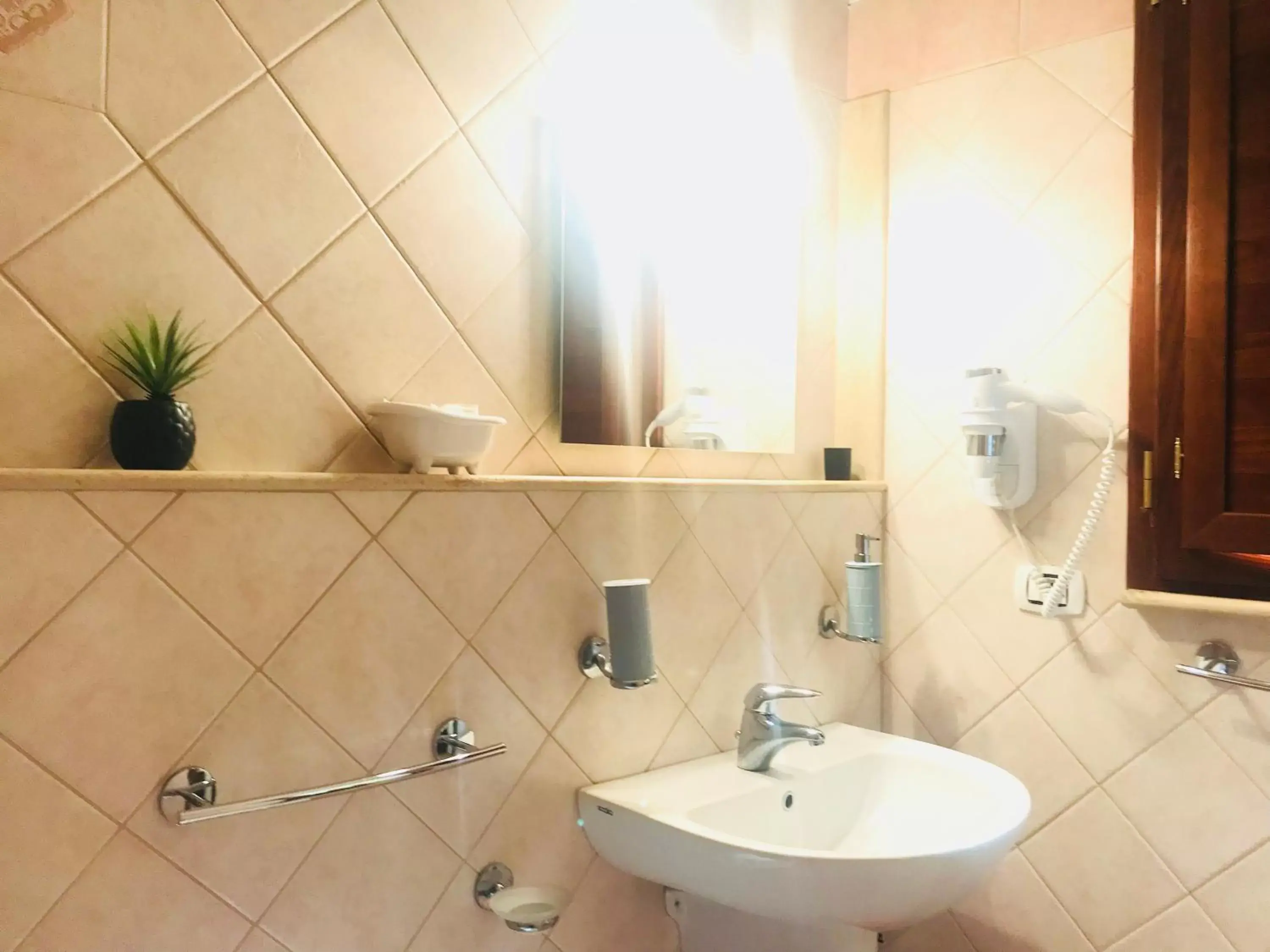Bathroom in Green Park Hotel & Residence