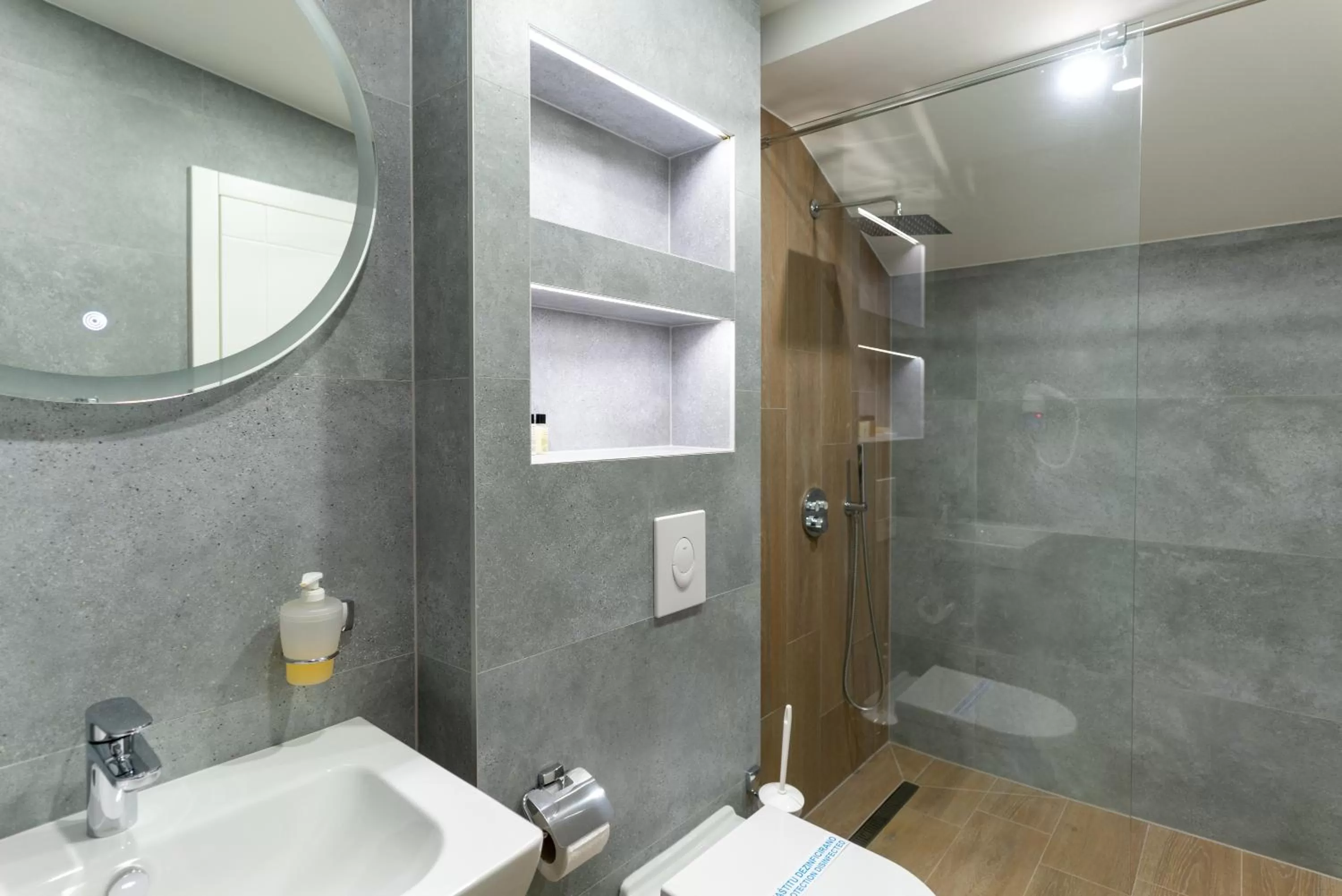 Bathroom in Ornament Hotel and Apartments