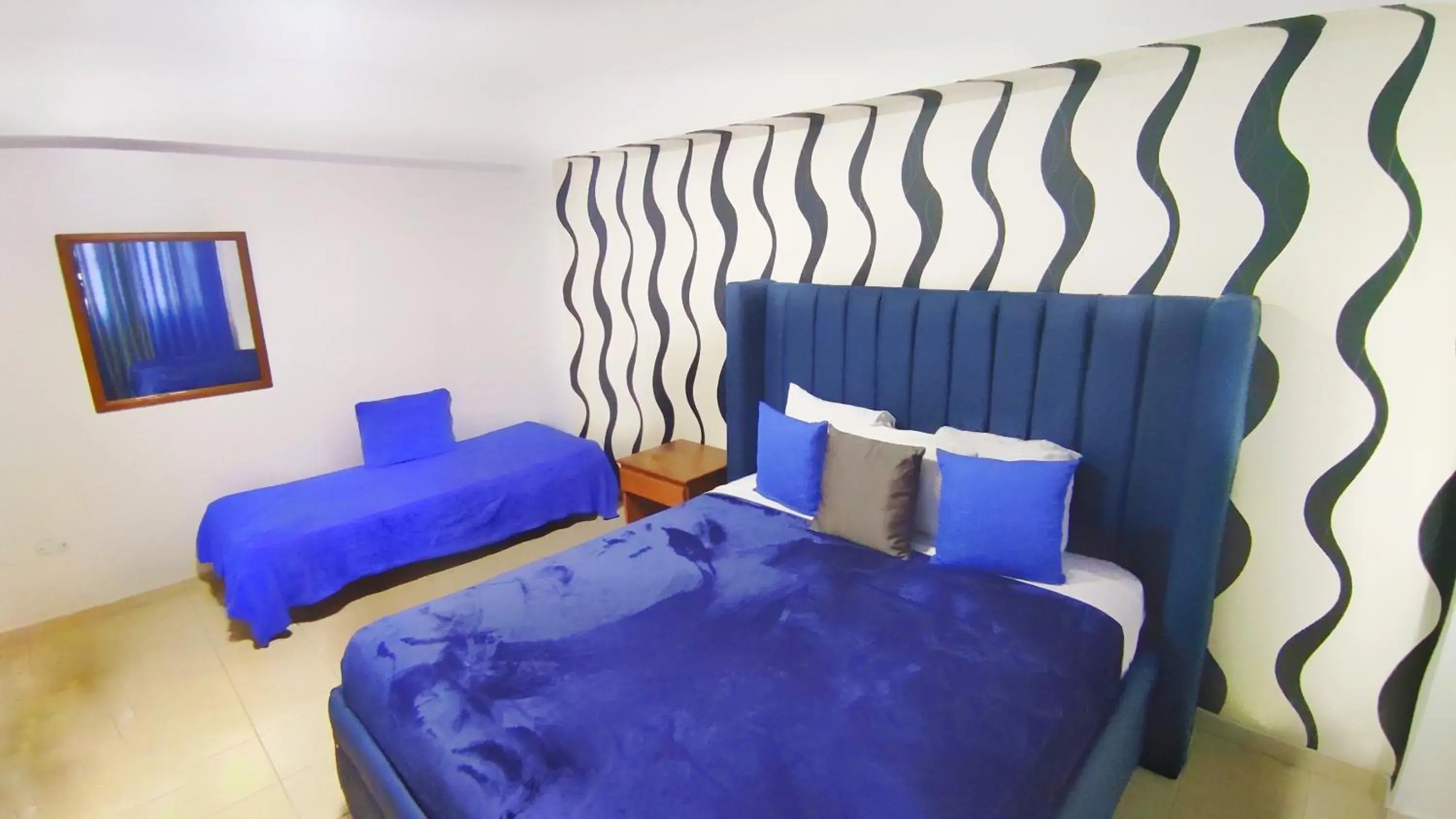 Bed in Acuarium Suite Resort Bed in Acuarium Suite Resort