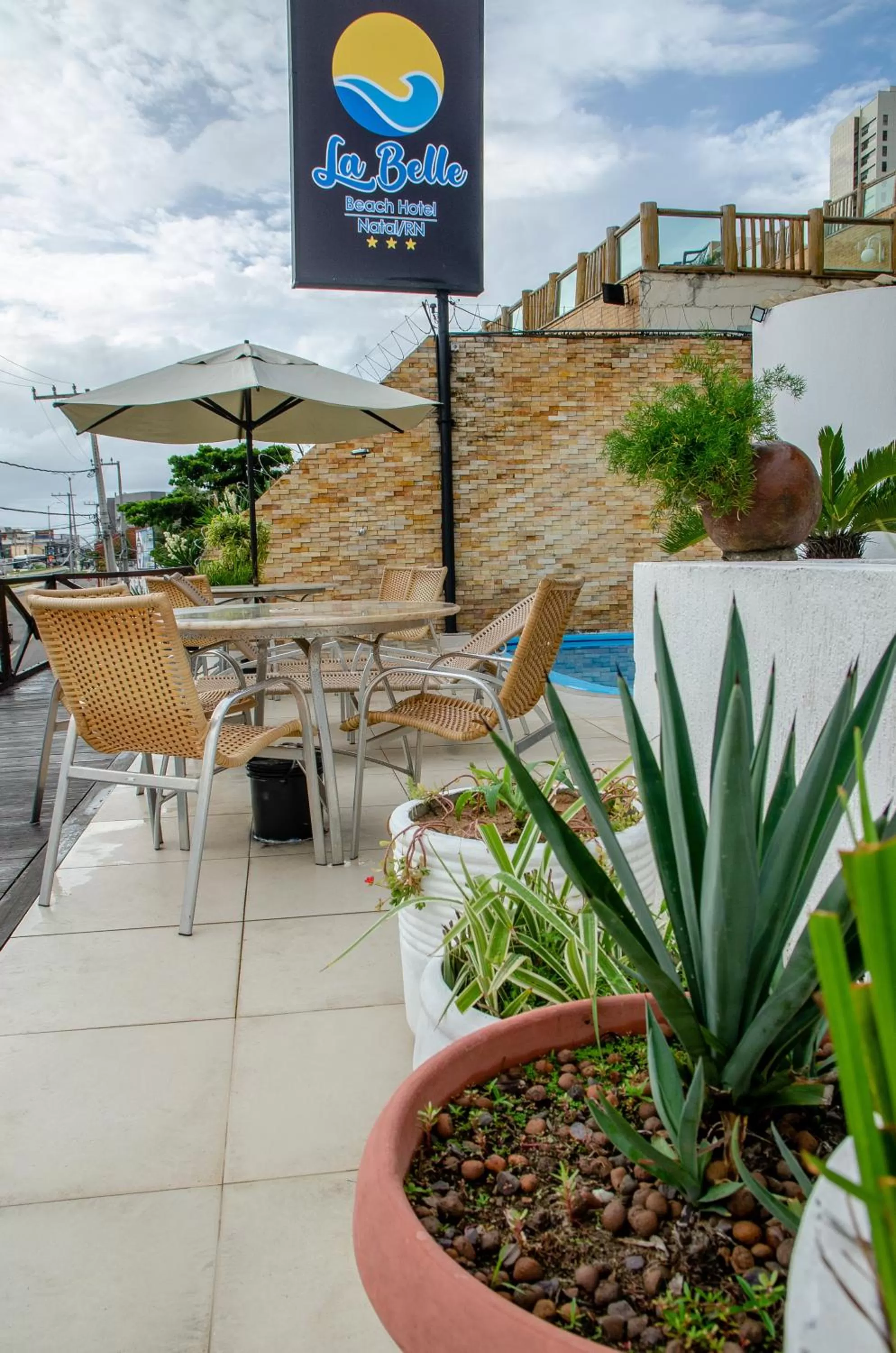 Property logo or sign in La Belle Beach Hotel