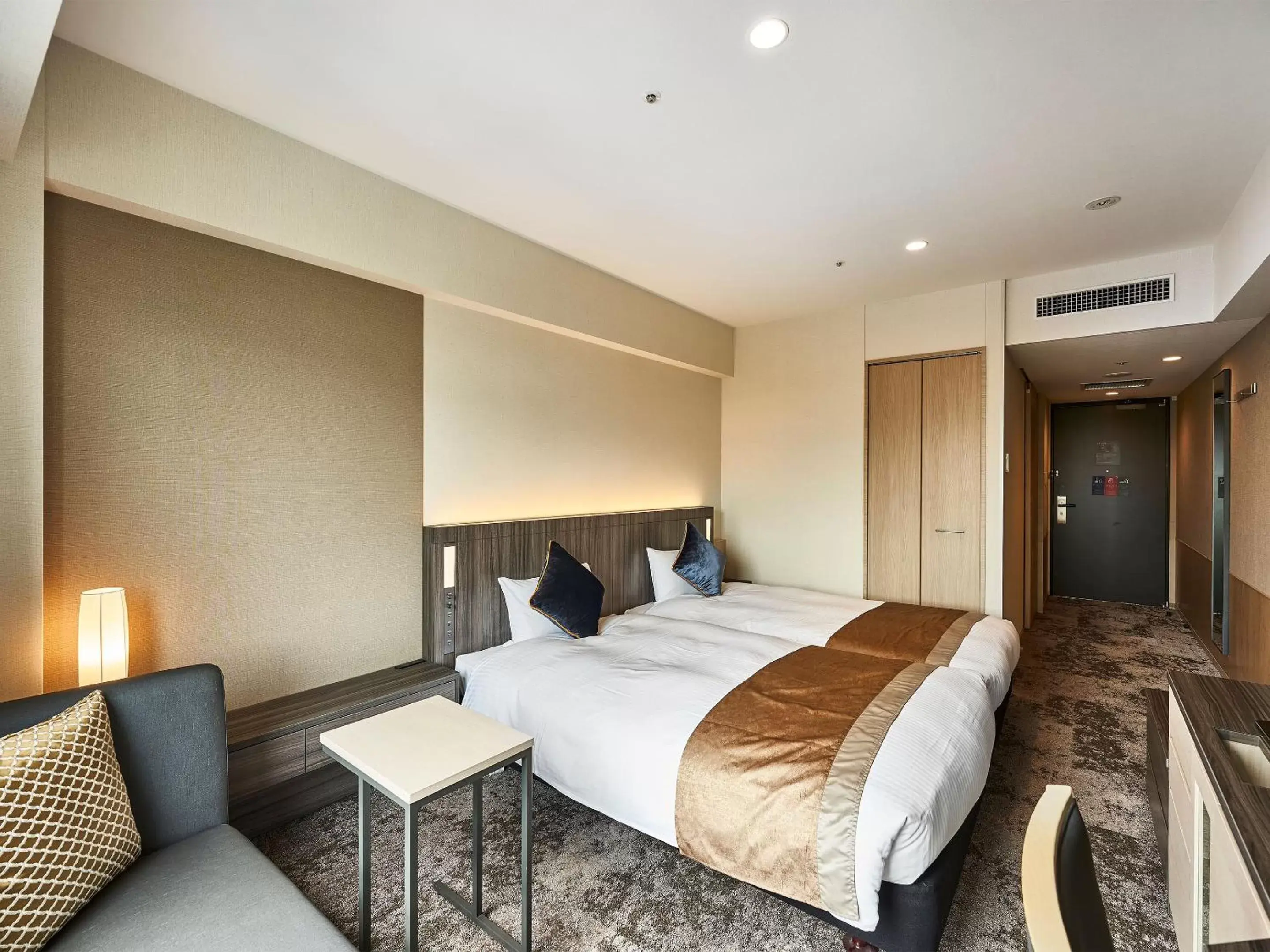 Bed in DEL style Osaka-Shinsaibashi by Daiwa Roynet Hotel