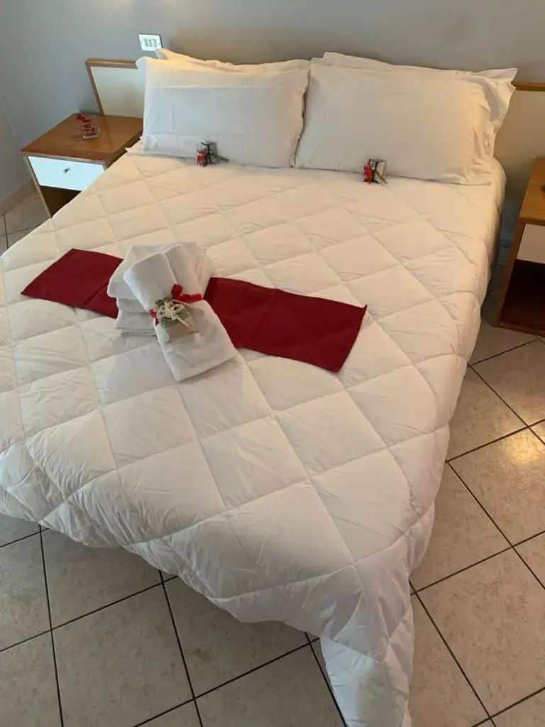 Bed in Hotel Oasi del Mare