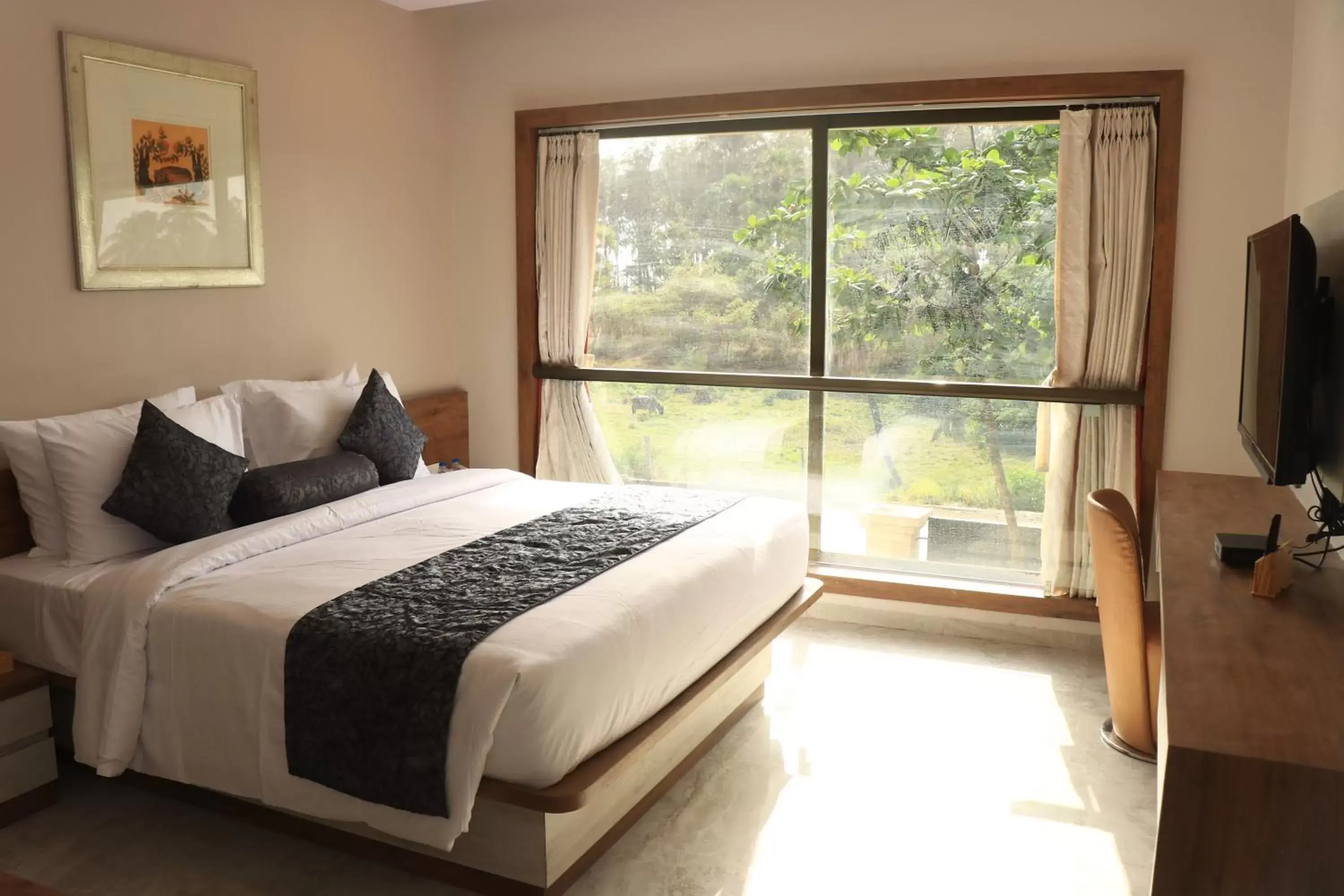 Bedroom, Bed in Nest Beacon Resort Daman