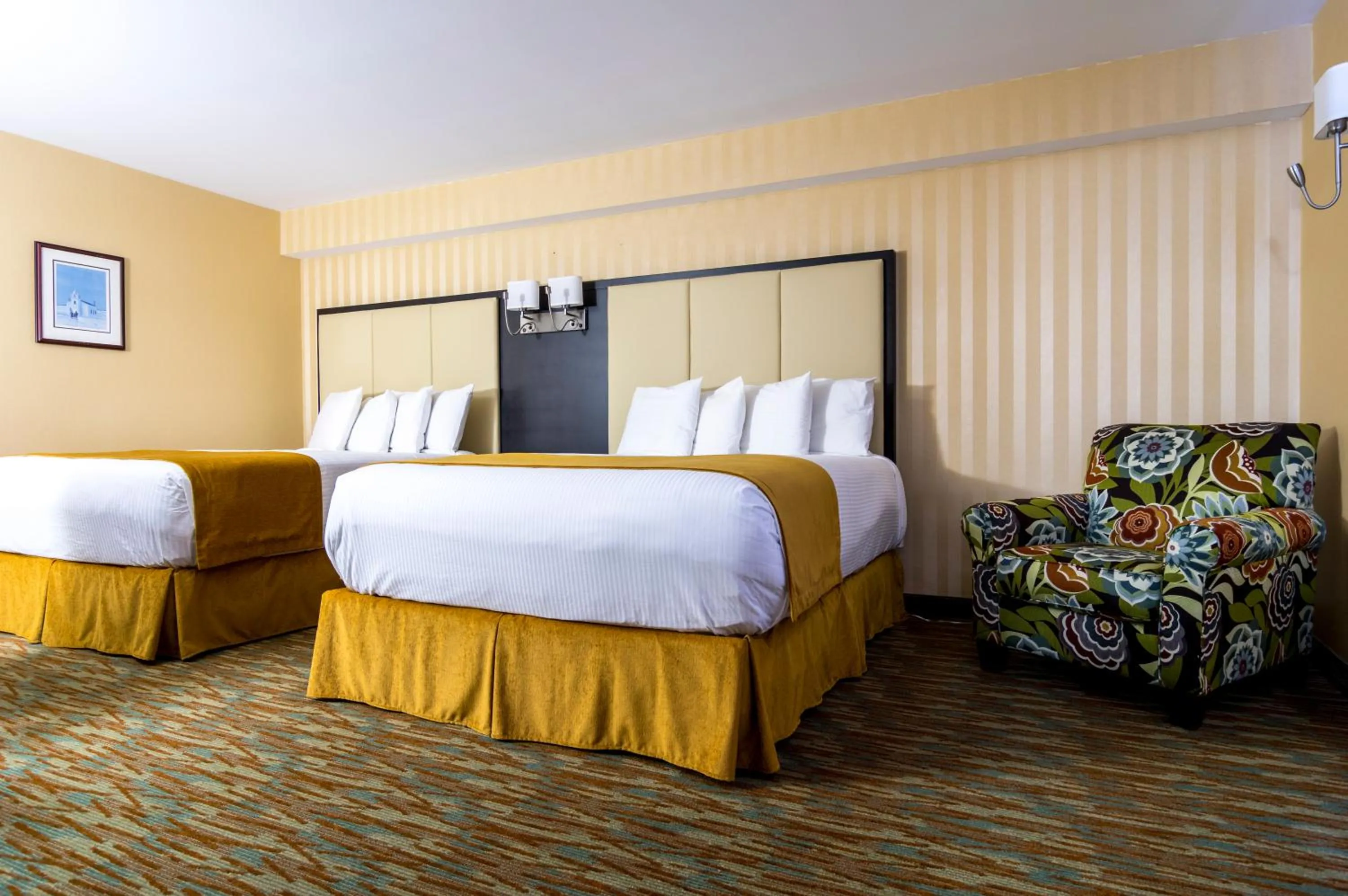 Bed in Sinbads Hotel & Suites