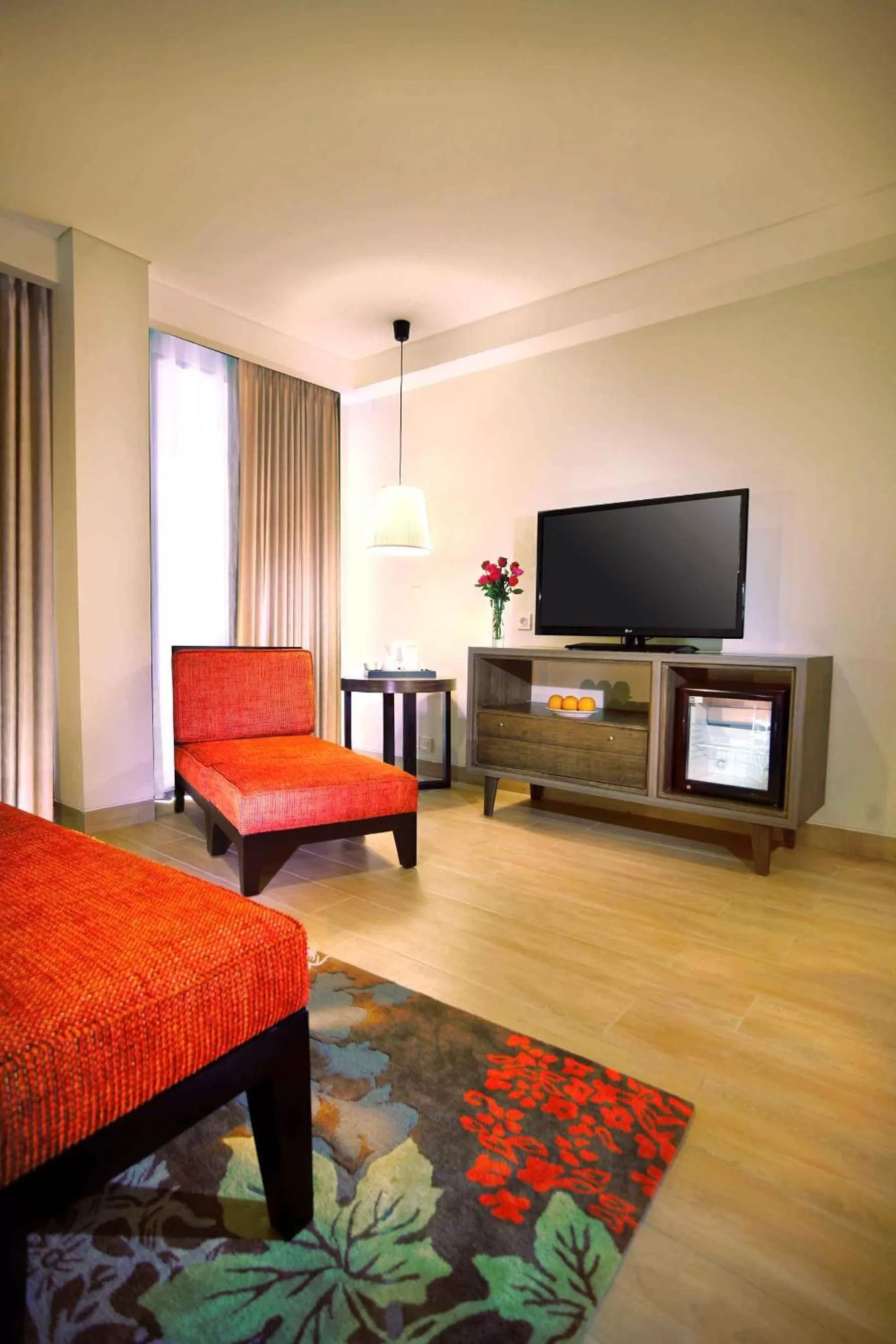 TV and multimedia in Harper Kuta Hotel by ASTON