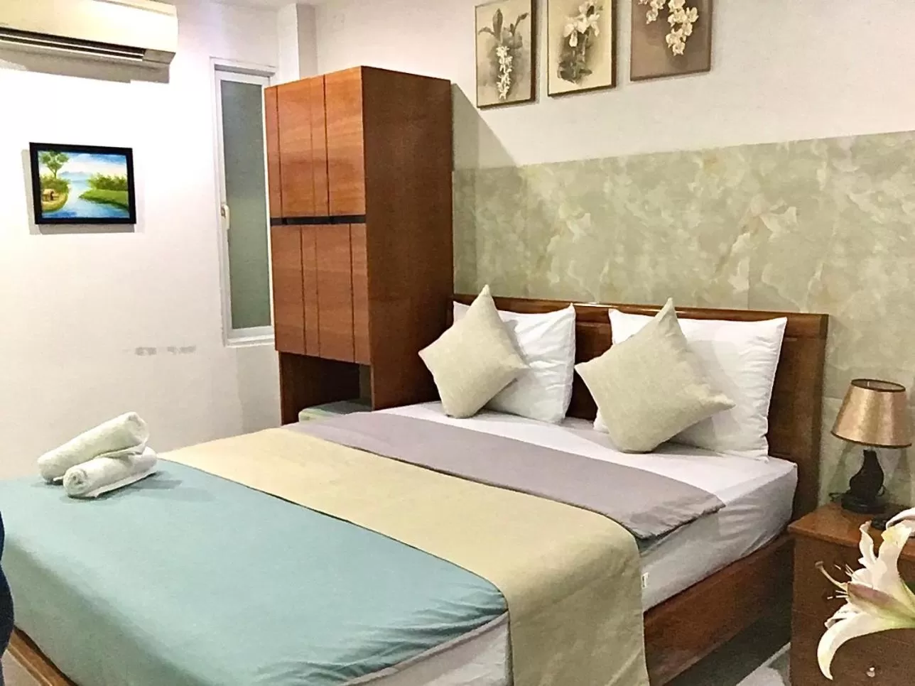 Bed in SaiGon CoZy Hotel "241 Pham Ngu Lao Street''