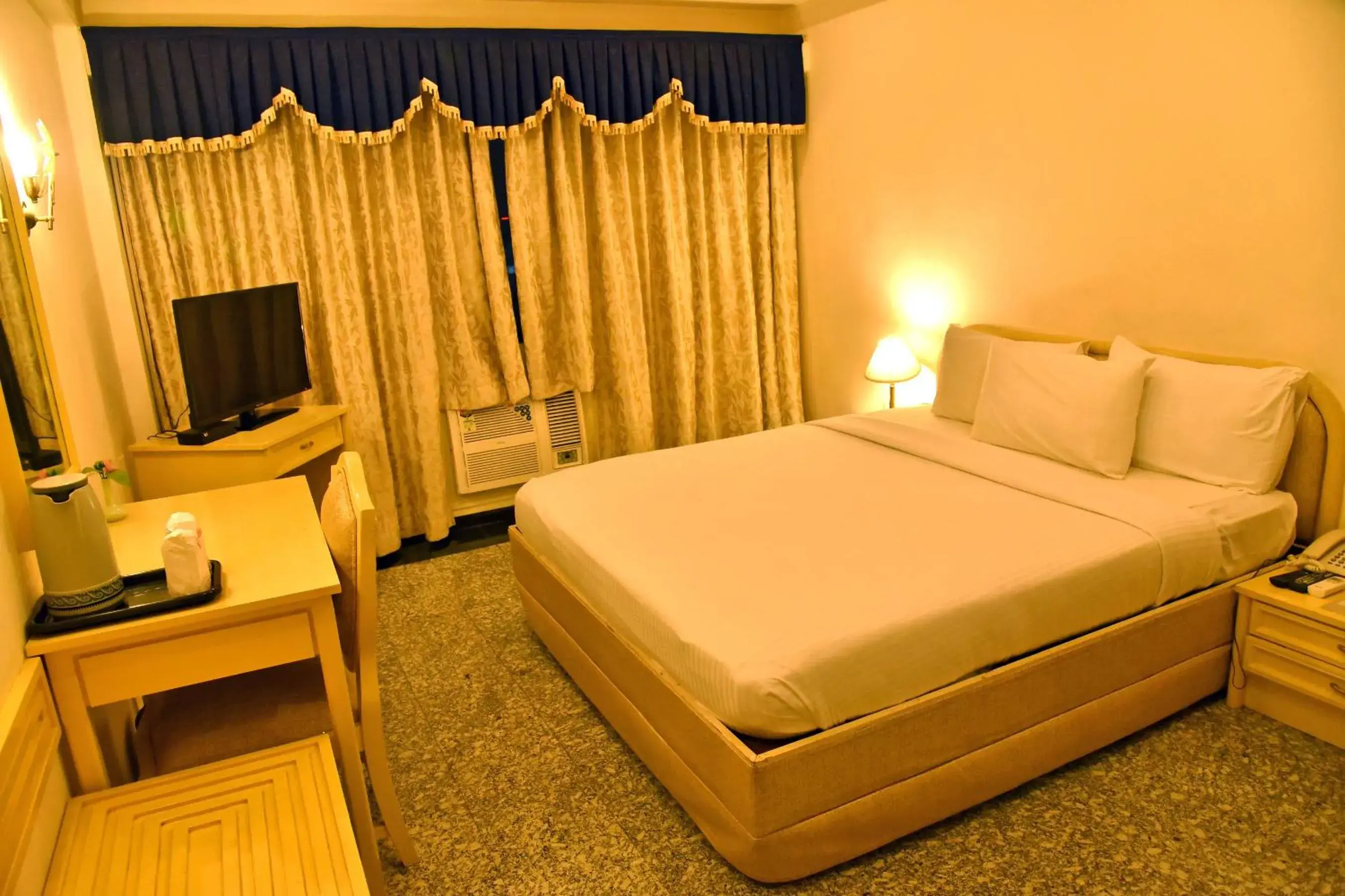 cot, Bed in Hotel Poonja International