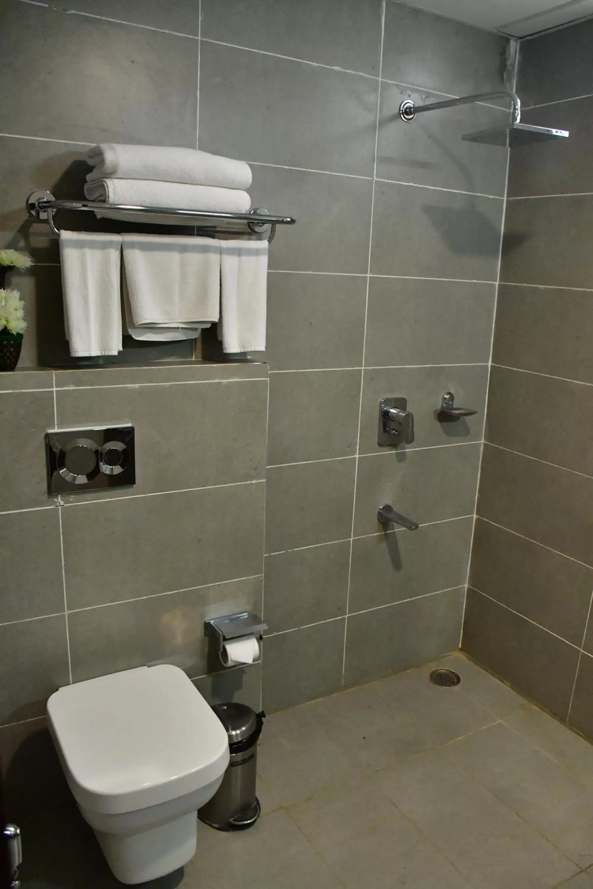 Bathroom in Hotel Yatharth Inn Bathroom in Hotel Yatharth Inn