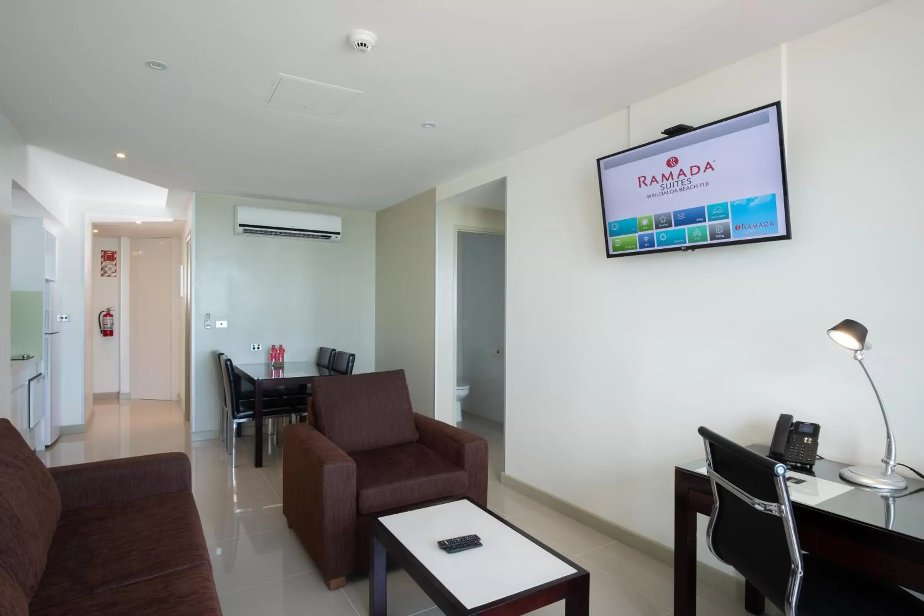 Living room, TV/Entertainment Center in Ramada Suites by Wyndham Wailoaloa Beach Fiji