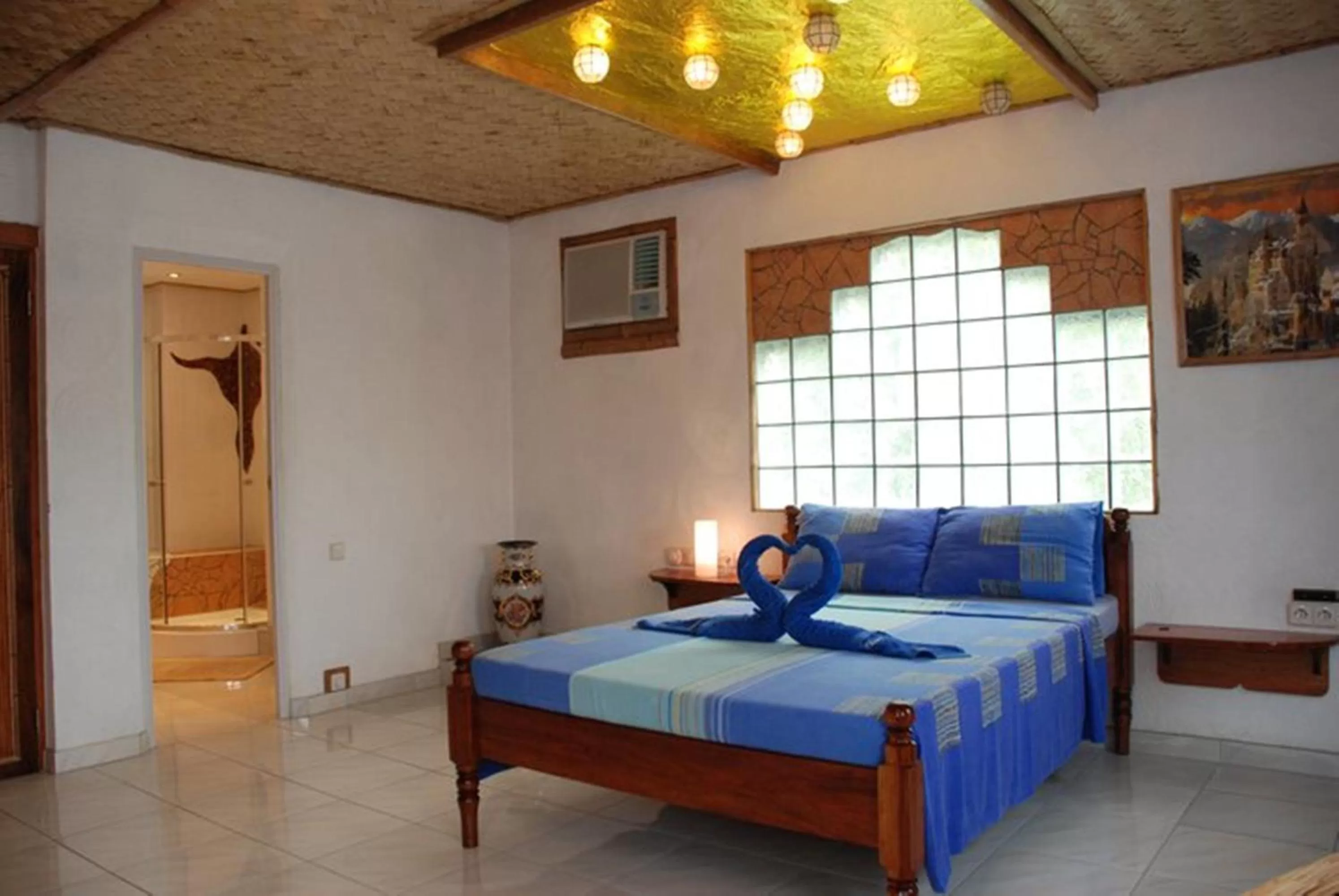 Photo of the whole room, Bed in Princess of Coron Austrian Resort