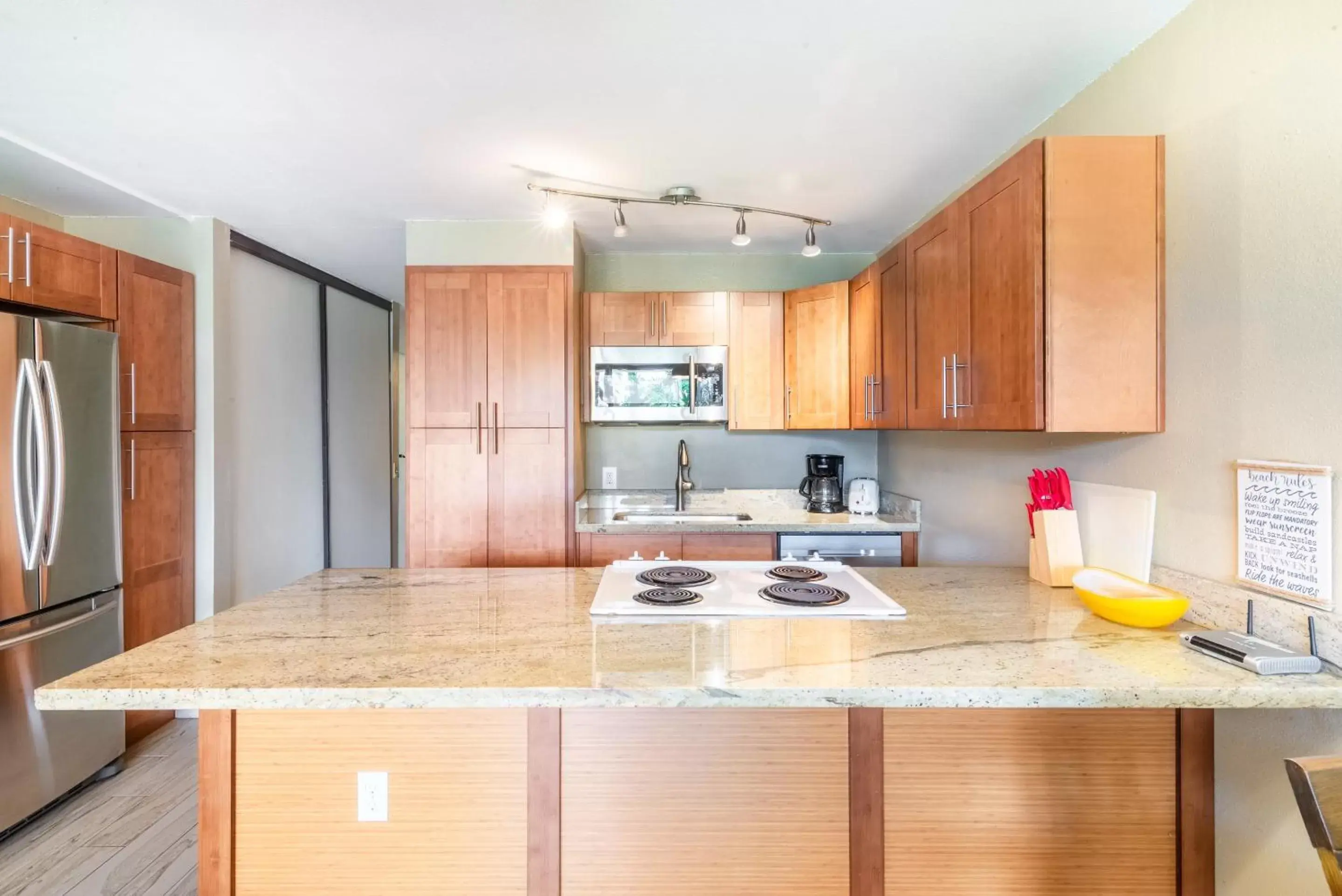 Kitchen/Kitchenette in BeachFront Kihei Kai Nani - Maui Vista Deluxe Condos