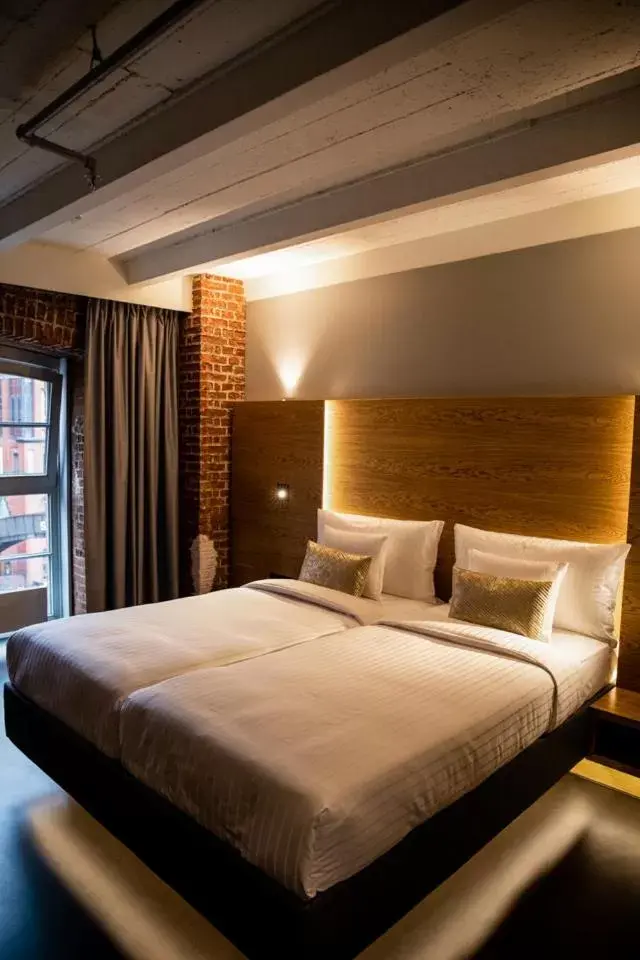 Photo of the whole room, Bed in GINN Hotel Hamburg Elbspeicher