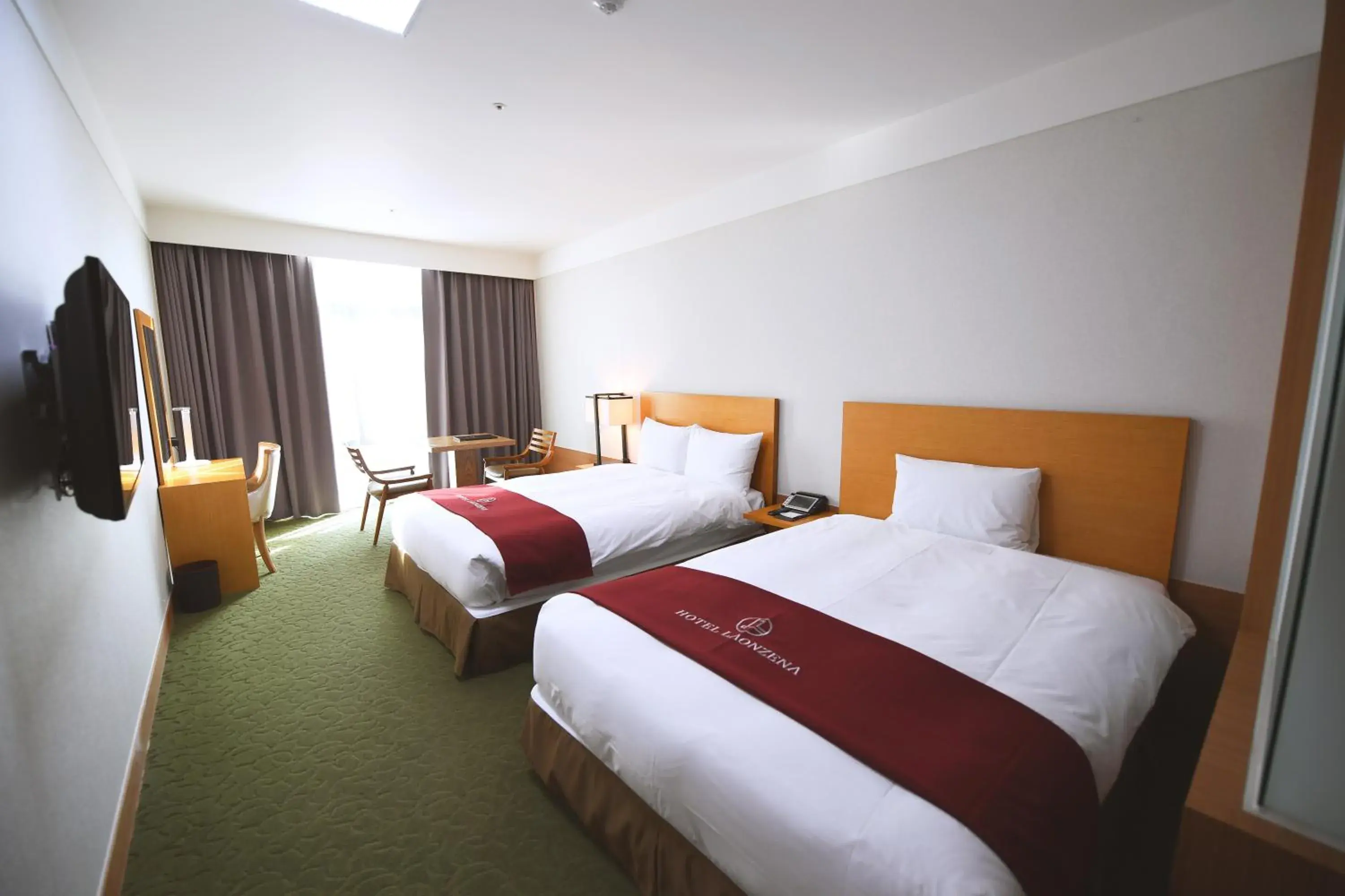 Bed in Hotel Laonzena