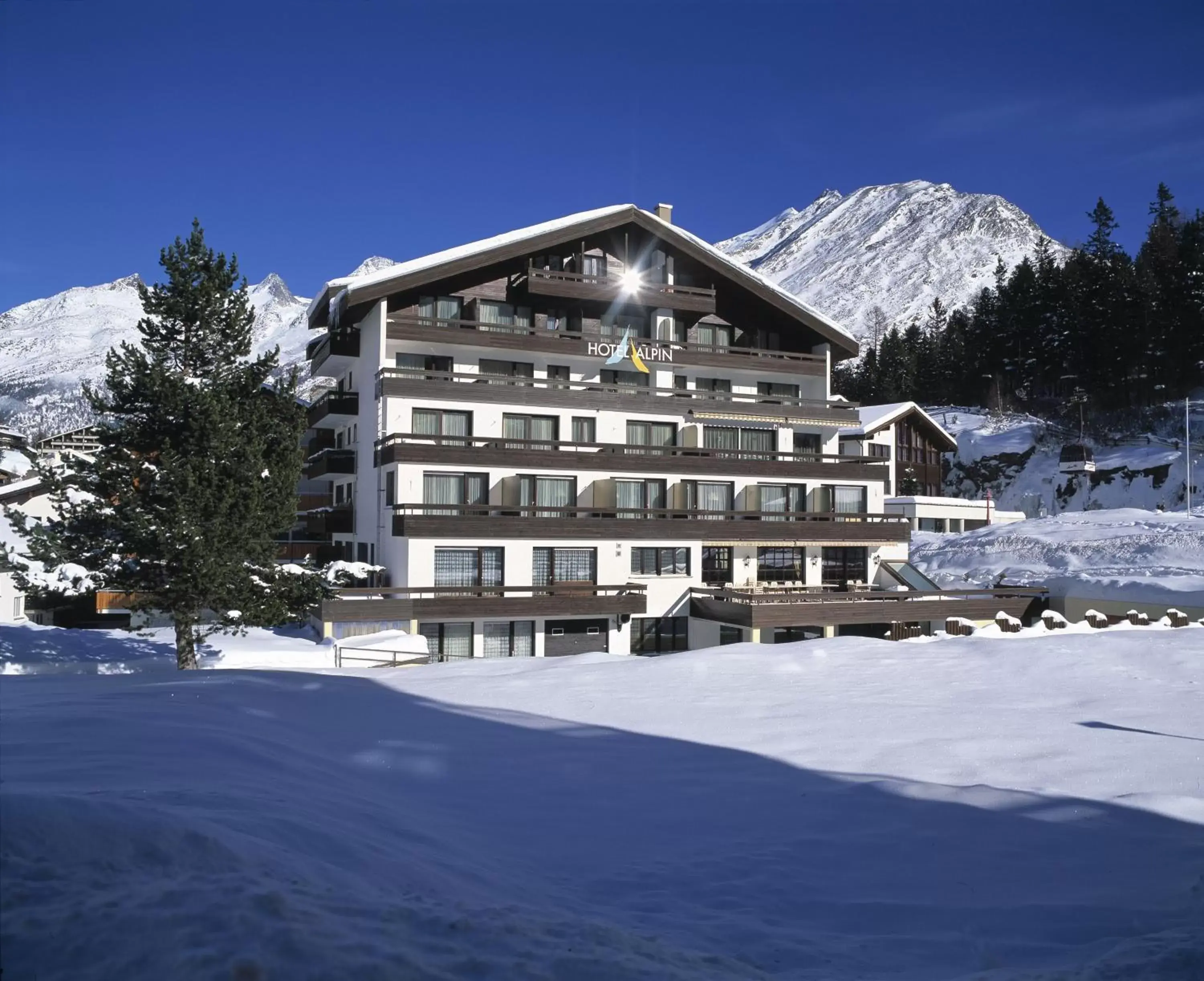 Property building, Winter in Hotel Alpin Superior